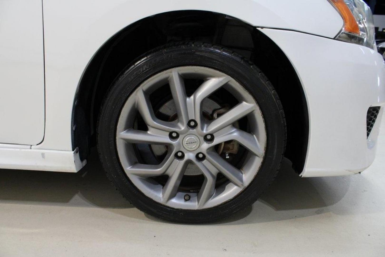 2014 Aspen White /Charcoal Nissan Sentra SR (3N1AB7AP6EY) with an 1.8L 4-Cylinder DOHC 16V engine, CVT transmission, located at 15300 Midway Rd., Addison, TX, 75001, (972) 702-0011, 32.958321, -96.838074 - HOME OF THE NO HAGGLE PRICE - WHOLESALE PRICES TO THE PUBLIC!!<br><br>Aspen White 2014 Nissan Sentra SR<br><br>30/39 City/Highway MPG<br><br>Awards:<br> * 2014 KBB.com 10 Best Used Compact Cars Under $10,000<br><br>At Midway Auto Group, we strive to provide you with the best quality vehicles for th - Photo#8