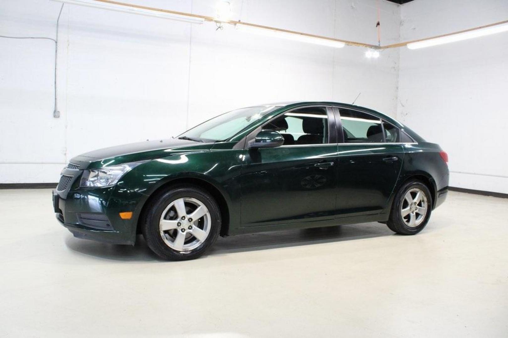 2014 Rainforest Green Metallic /Jet Black Chevrolet Cruze 1LT (1G1PC5SB3E7) with an ECOTEC 1.4L I4 SMPI DOHC Turbocharged VVT engine, Automatic transmission, located at 15300 Midway Rd., Addison, TX, 75001, (972) 702-0011, 32.958321, -96.838074 - Photo#2