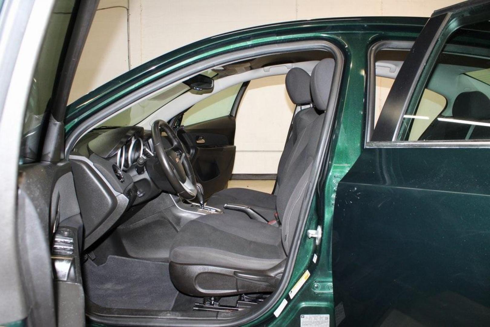 2014 Rainforest Green Metallic /Jet Black Chevrolet Cruze 1LT (1G1PC5SB3E7) with an ECOTEC 1.4L I4 SMPI DOHC Turbocharged VVT engine, Automatic transmission, located at 15300 Midway Rd., Addison, TX, 75001, (972) 702-0011, 32.958321, -96.838074 - Photo#8