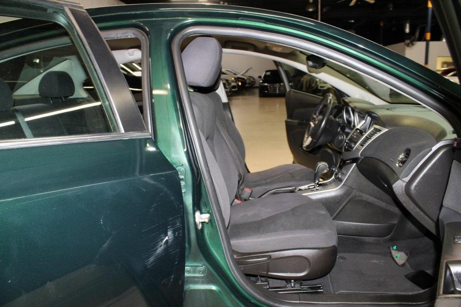 2014 Rainforest Green Metallic /Jet Black Chevrolet Cruze 1LT (1G1PC5SB3E7) with an ECOTEC 1.4L I4 SMPI DOHC Turbocharged VVT engine, Automatic transmission, located at 15300 Midway Rd., Addison, TX, 75001, (972) 702-0011, 32.958321, -96.838074 - Photo#9