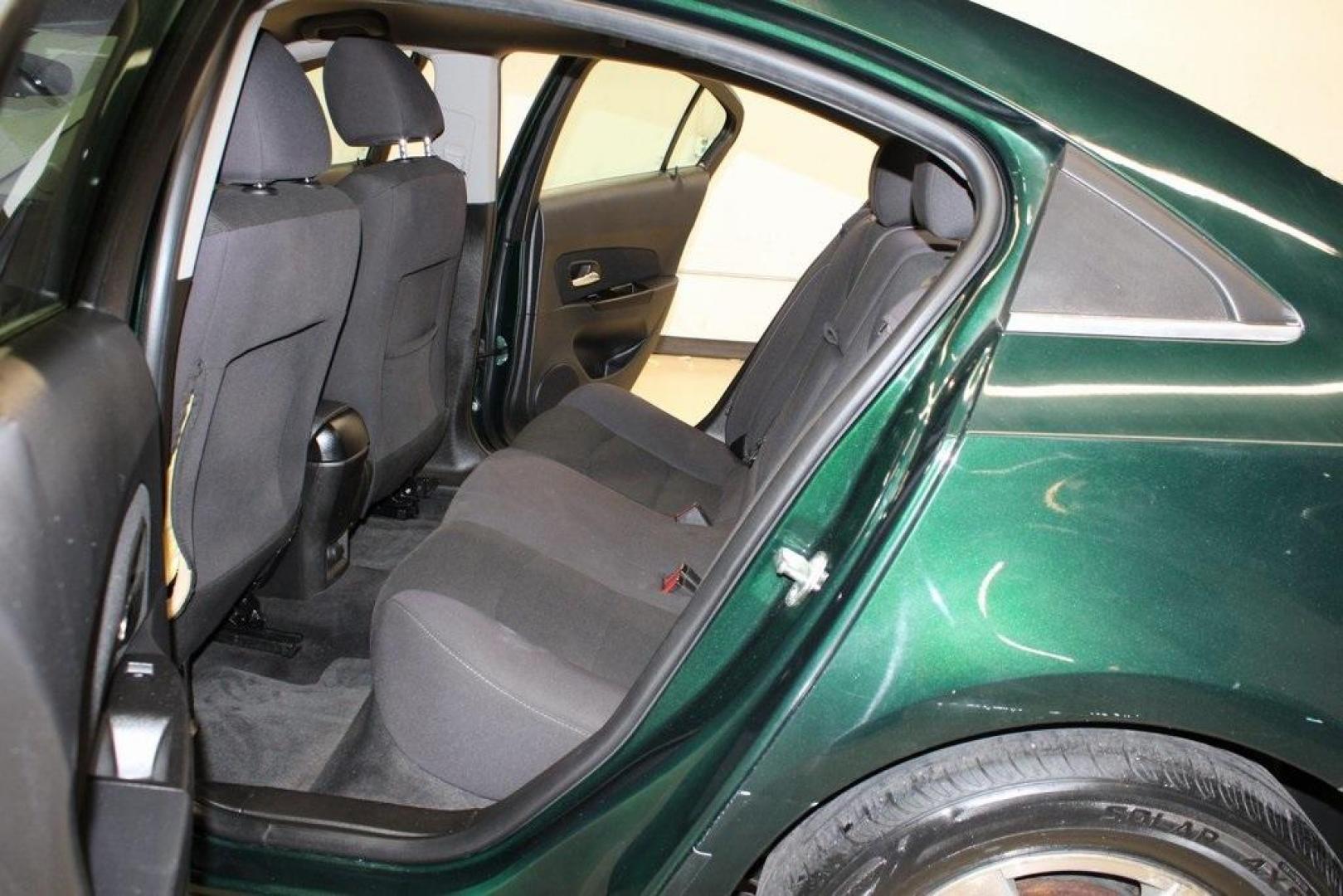 2014 Rainforest Green Metallic /Jet Black Chevrolet Cruze 1LT (1G1PC5SB3E7) with an ECOTEC 1.4L I4 SMPI DOHC Turbocharged VVT engine, Automatic transmission, located at 15300 Midway Rd., Addison, TX, 75001, (972) 702-0011, 32.958321, -96.838074 - Photo#12