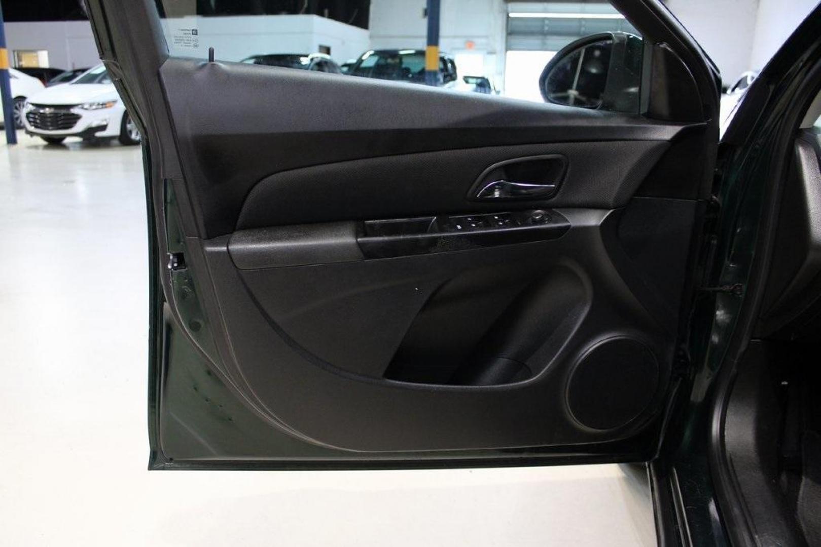 2014 Rainforest Green Metallic /Jet Black Chevrolet Cruze 1LT (1G1PC5SB3E7) with an ECOTEC 1.4L I4 SMPI DOHC Turbocharged VVT engine, Automatic transmission, located at 15300 Midway Rd., Addison, TX, 75001, (972) 702-0011, 32.958321, -96.838074 - Photo#18