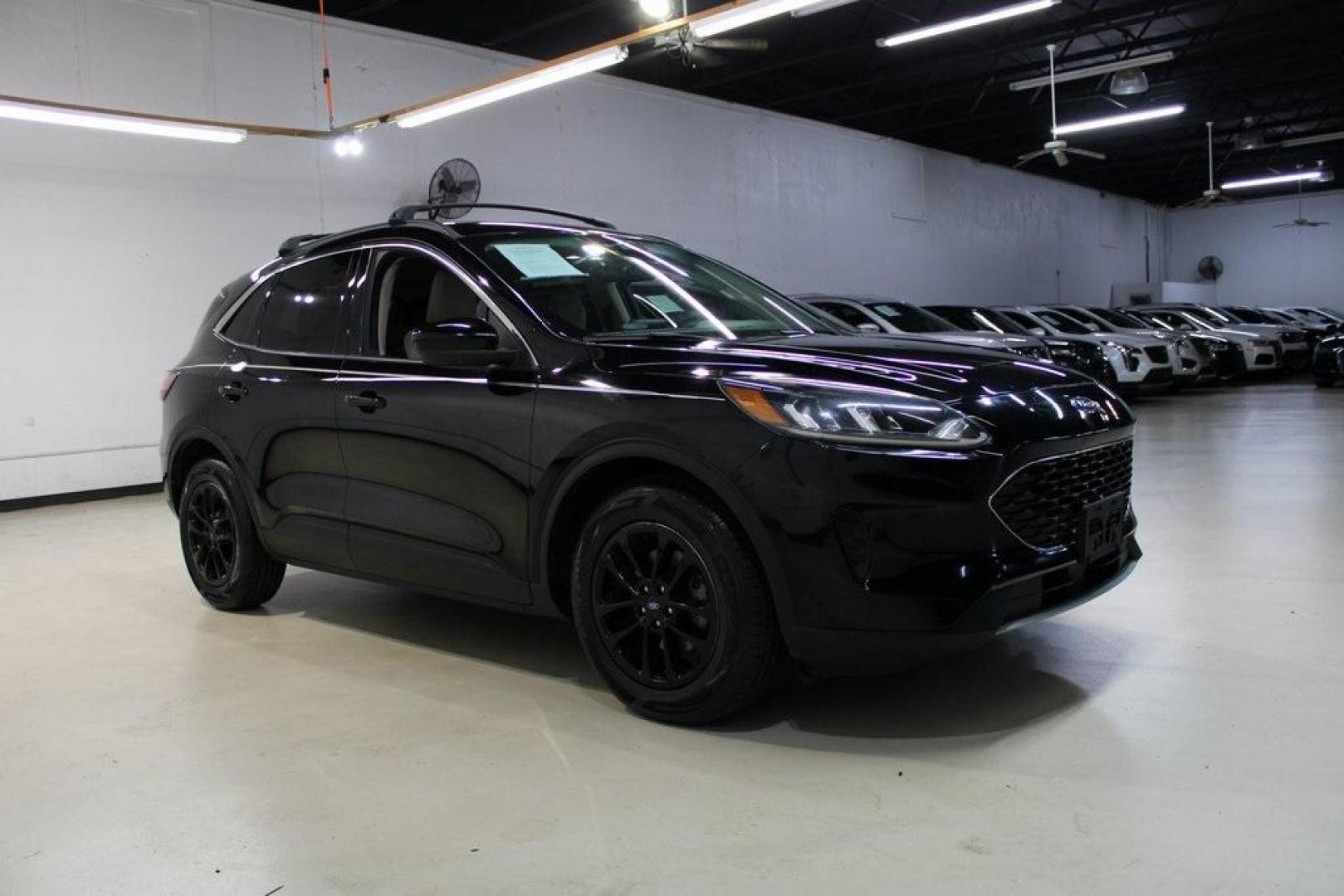 2020 Black /Sandstone Ford Escape SE (1FMCU0G61LU) with an 1.5L EcoBoost engine, Automatic transmission, located at 15300 Midway Rd., Addison, TX, 75001, (972) 702-0011, 32.958321, -96.838074 - Photo#6