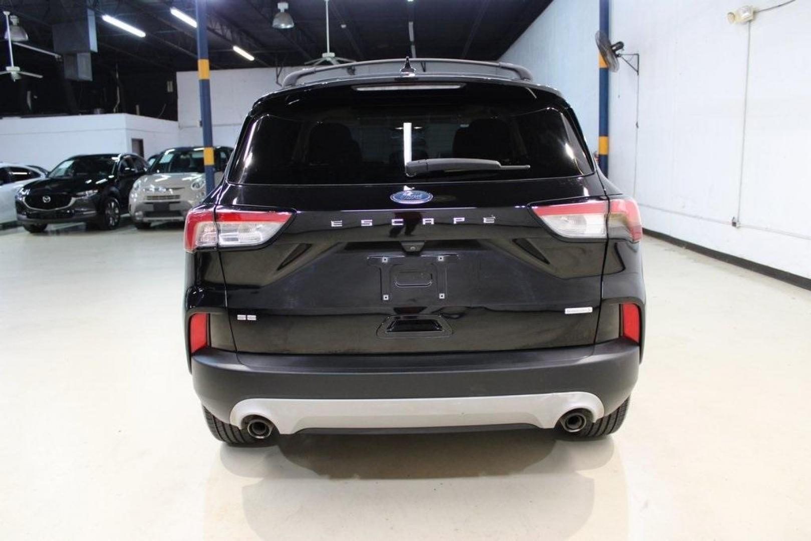 2020 Black /Sandstone Ford Escape SE (1FMCU0G61LU) with an 1.5L EcoBoost engine, Automatic transmission, located at 15300 Midway Rd., Addison, TX, 75001, (972) 702-0011, 32.958321, -96.838074 - Photo#7