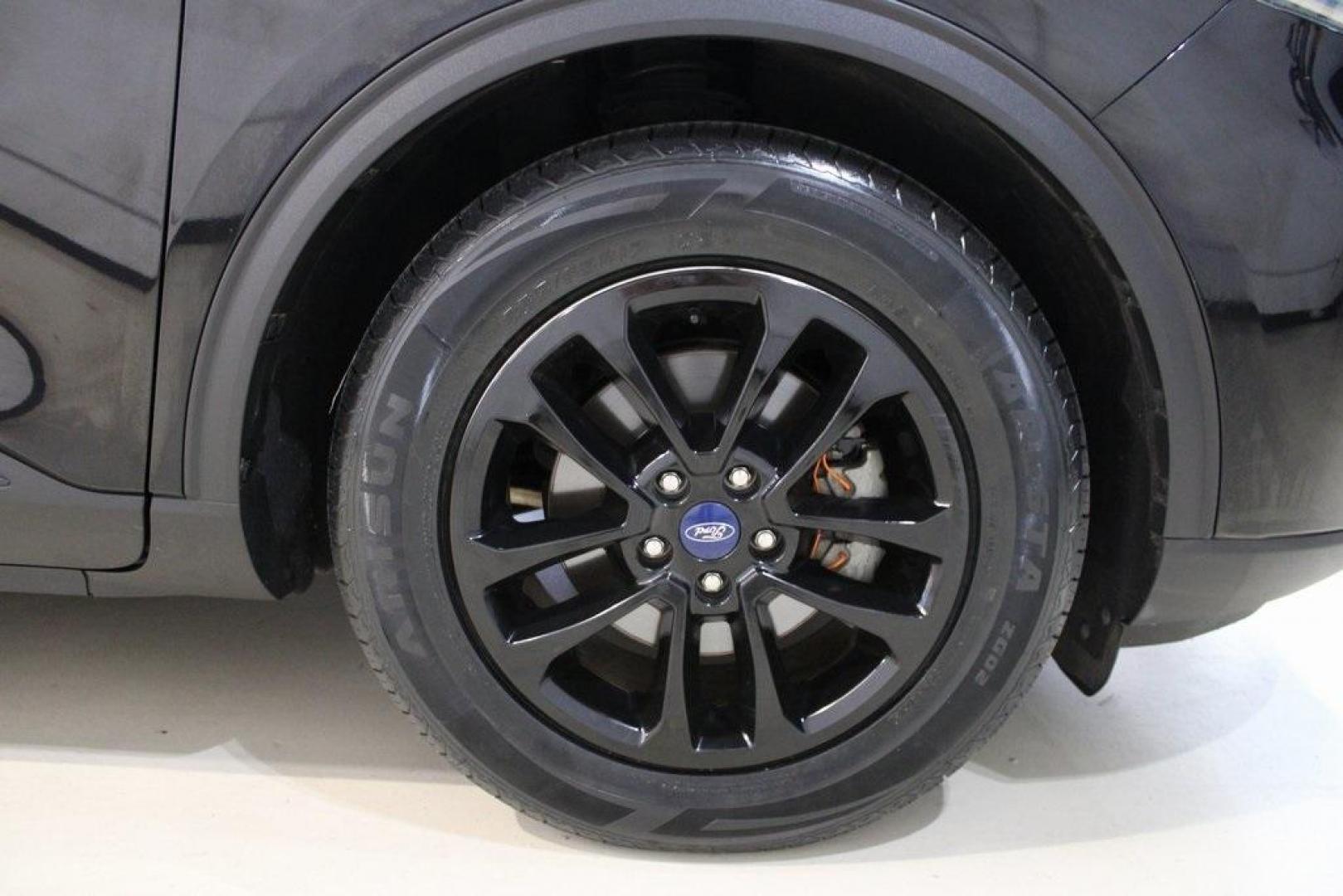 2020 Black /Sandstone Ford Escape SE (1FMCU0G61LU) with an 1.5L EcoBoost engine, Automatic transmission, located at 15300 Midway Rd., Addison, TX, 75001, (972) 702-0011, 32.958321, -96.838074 - Photo#11