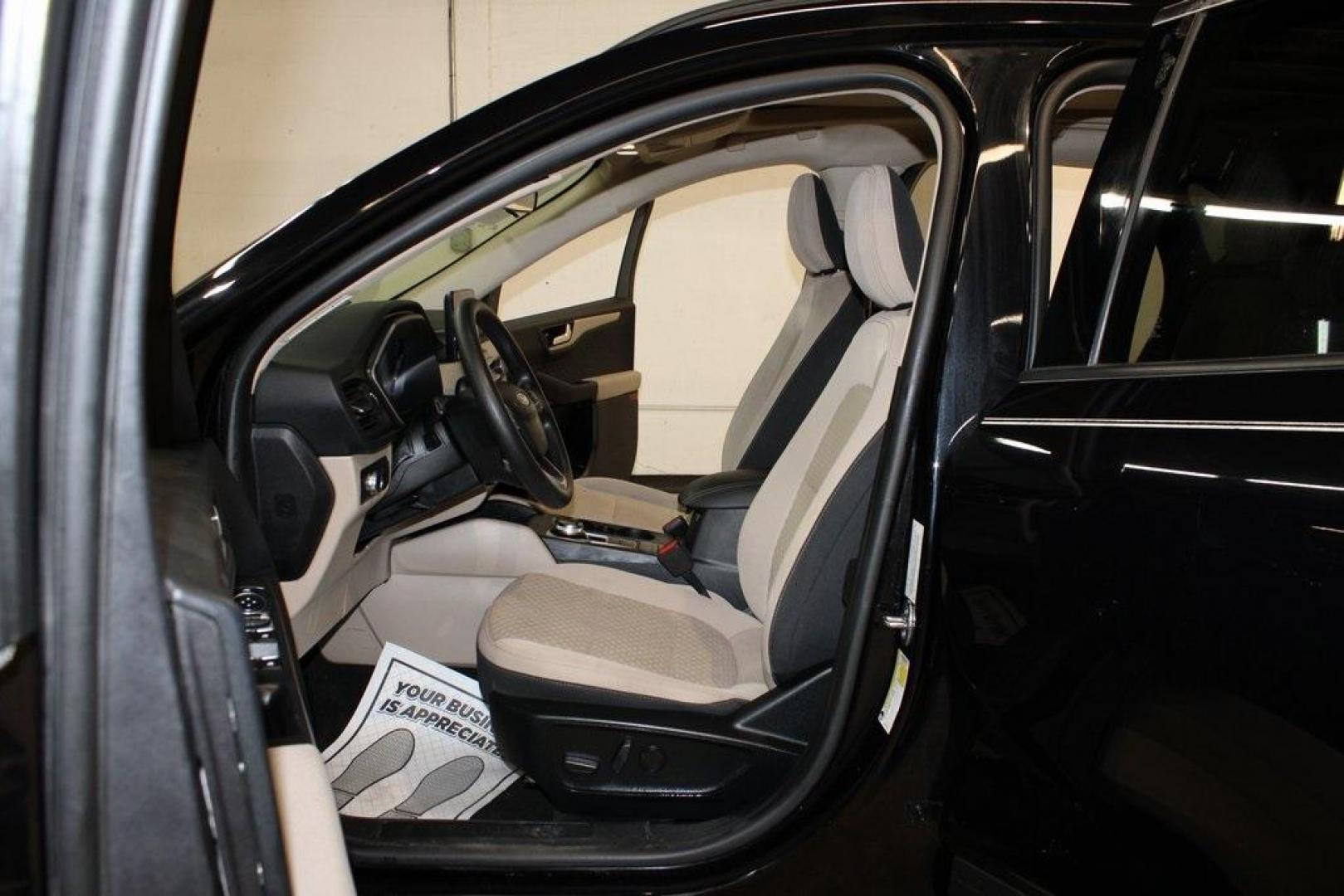 2020 Black /Sandstone Ford Escape SE (1FMCU0G61LU) with an 1.5L EcoBoost engine, Automatic transmission, located at 15300 Midway Rd., Addison, TX, 75001, (972) 702-0011, 32.958321, -96.838074 - Photo#13