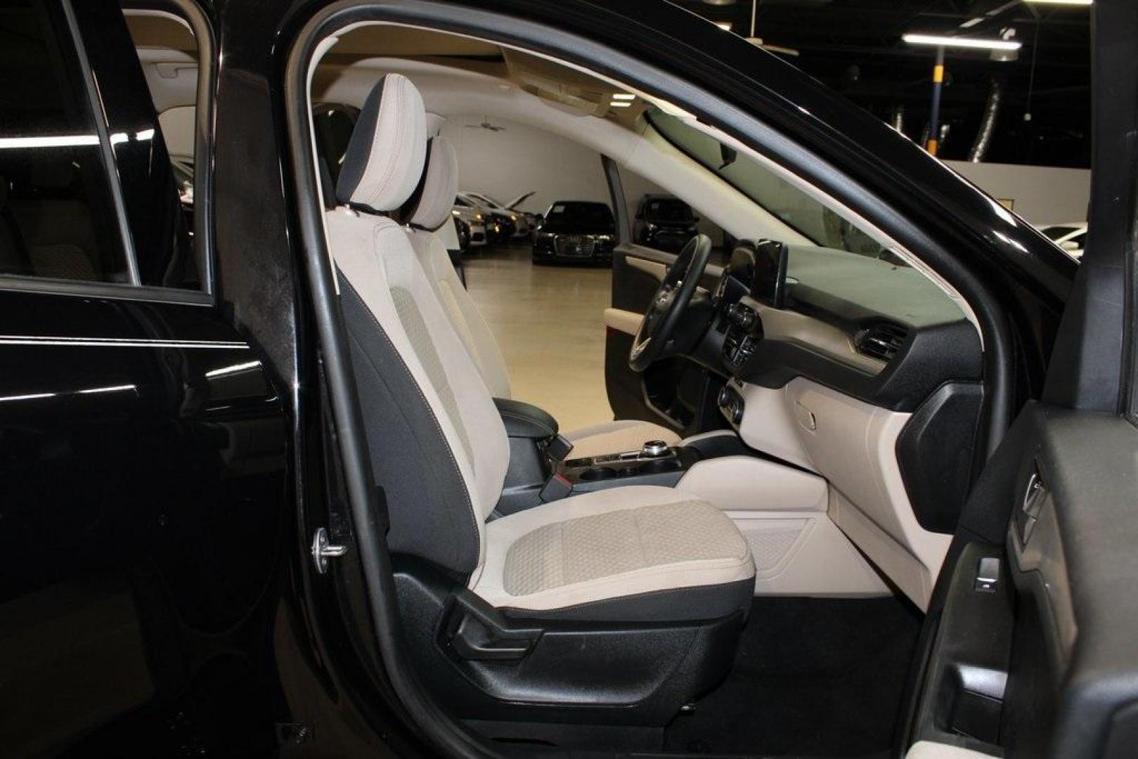 2020 Black /Sandstone Ford Escape SE (1FMCU0G61LU) with an 1.5L EcoBoost engine, Automatic transmission, located at 15300 Midway Rd., Addison, TX, 75001, (972) 702-0011, 32.958321, -96.838074 - Photo#14