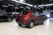 2017 Crimson Metallic /Black Chevrolet Trax LS (3GNCJKSB0HL) with an ECOTEC 1.4L I4 SMPI DOHC Turbocharged VVT engine, Automatic transmission, located at 15300 Midway Rd., Addison, TX, 75001, (972) 702-0011, 32.958321, -96.838074 - Photo#2