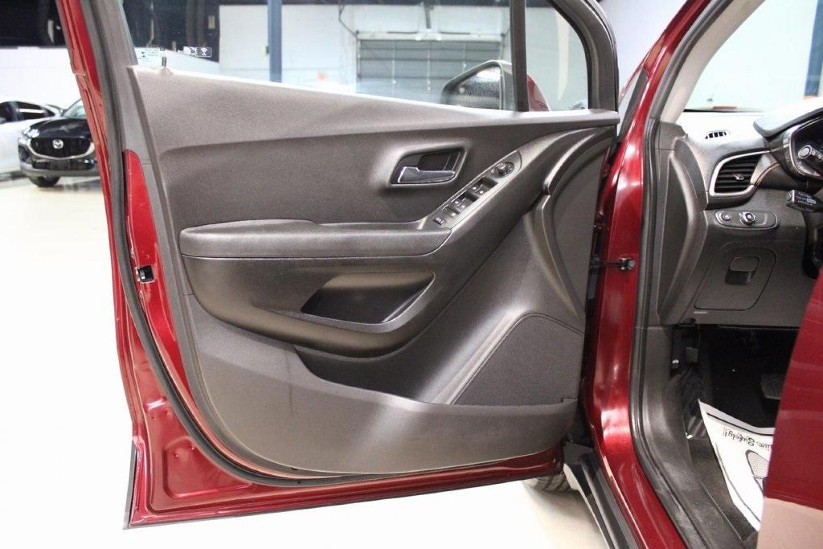 2017 Crimson Metallic /Black Chevrolet Trax LS (3GNCJKSB0HL) with an ECOTEC 1.4L I4 SMPI DOHC Turbocharged VVT engine, Automatic transmission, located at 15300 Midway Rd., Addison, TX, 75001, (972) 702-0011, 32.958321, -96.838074 - Photo#20