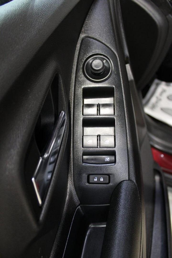 2017 Crimson Metallic /Black Chevrolet Trax LS (3GNCJKSB0HL) with an ECOTEC 1.4L I4 SMPI DOHC Turbocharged VVT engine, Automatic transmission, located at 15300 Midway Rd., Addison, TX, 75001, (972) 702-0011, 32.958321, -96.838074 - Photo#21