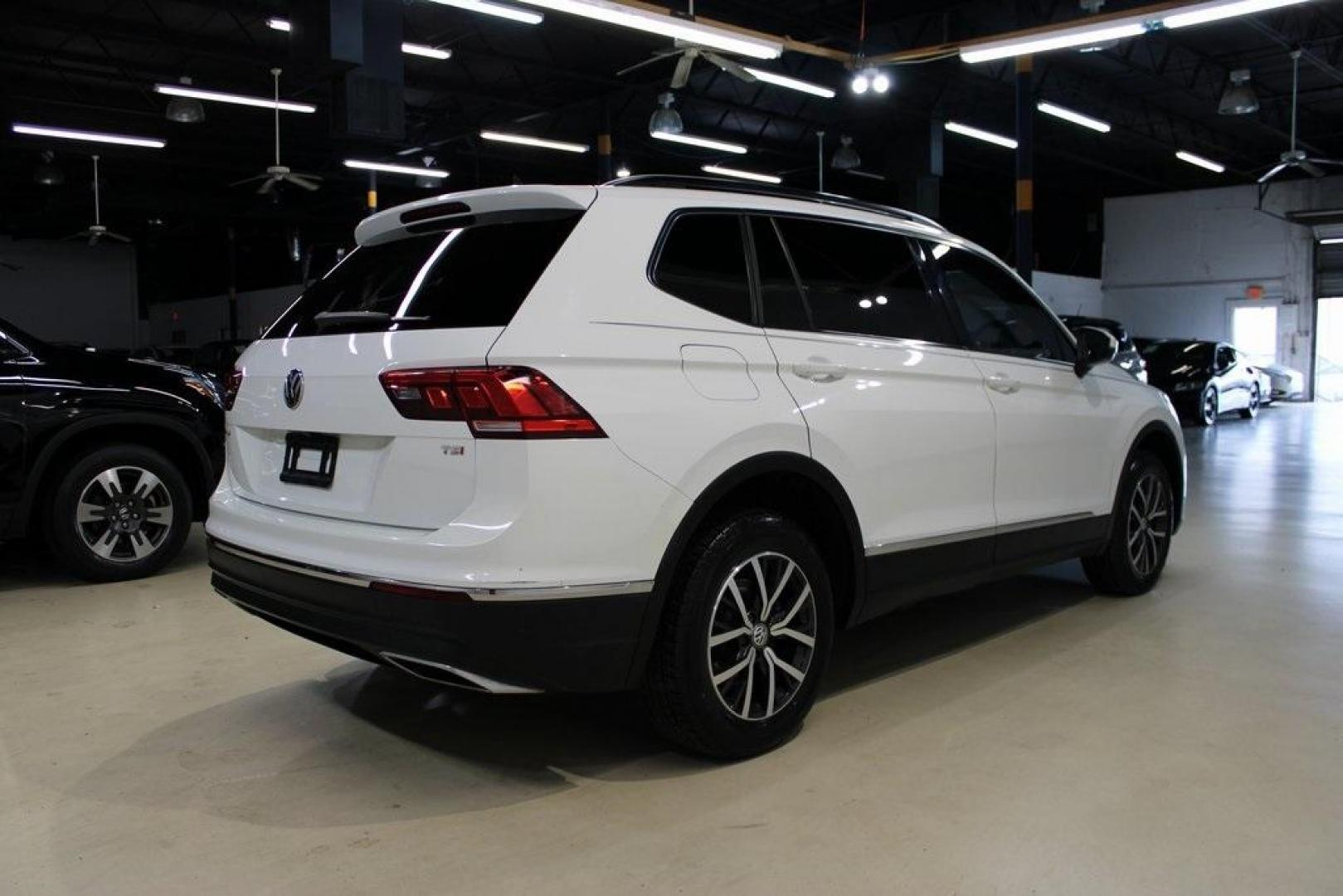 2018 Pure White /Golden Oak and Black Volkswagen Tiguan 2.0T SE (3VV3B7AX1JM) with an 2.0L TSI DOHC engine, Automatic transmission, located at 15300 Midway Rd., Addison, TX, 75001, (972) 702-0011, 32.958321, -96.838074 - Photo#2