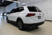 2018 Pure White /Golden Oak and Black Volkswagen Tiguan 2.0T SE (3VV3B7AX1JM) with an 2.0L TSI DOHC engine, Automatic transmission, located at 15300 Midway Rd., Addison, TX, 75001, (972) 702-0011, 32.958321, -96.838074 - Photo#3
