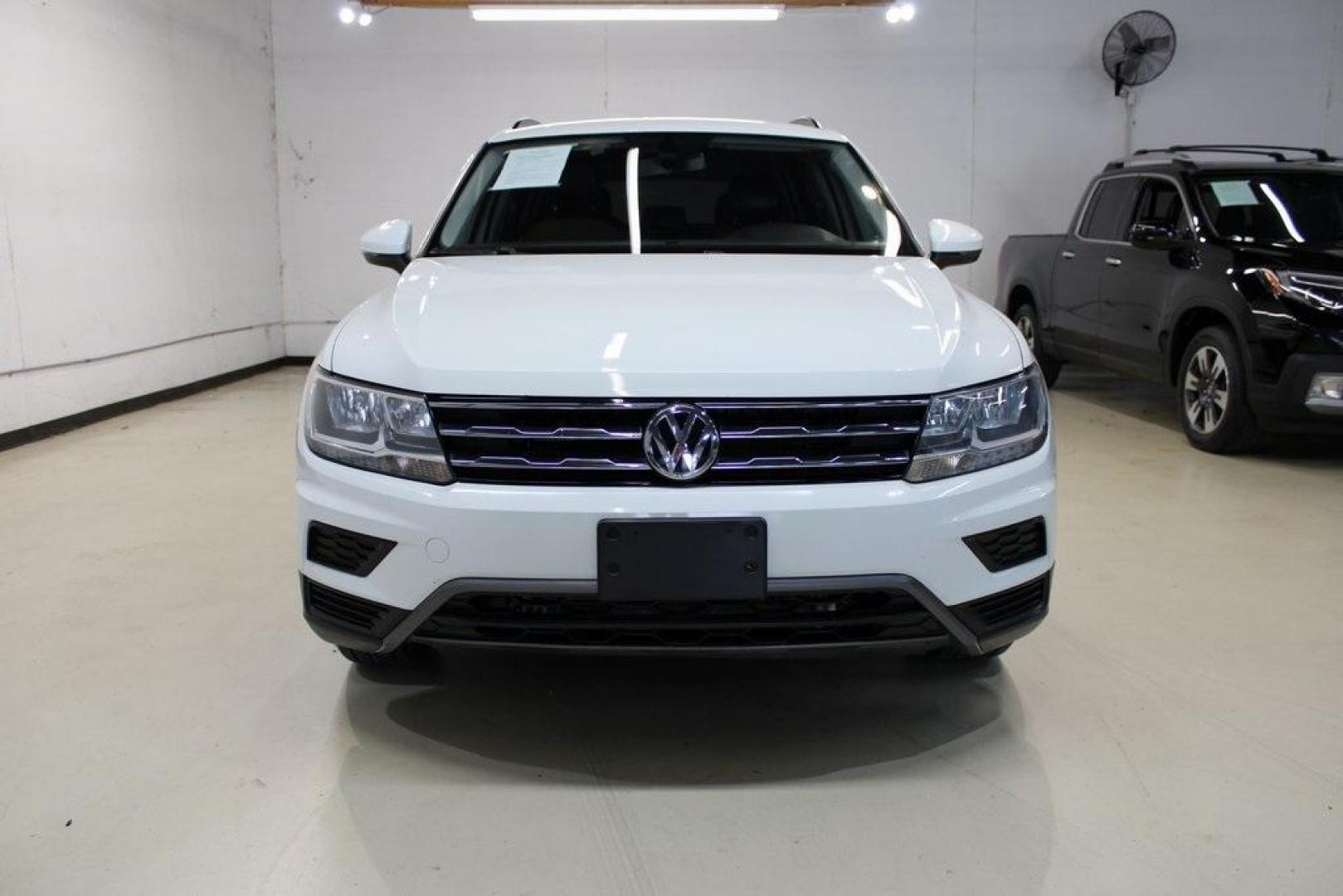 2018 Pure White /Golden Oak and Black Volkswagen Tiguan 2.0T SE (3VV3B7AX1JM) with an 2.0L TSI DOHC engine, Automatic transmission, located at 15300 Midway Rd., Addison, TX, 75001, (972) 702-0011, 32.958321, -96.838074 - Photo#5