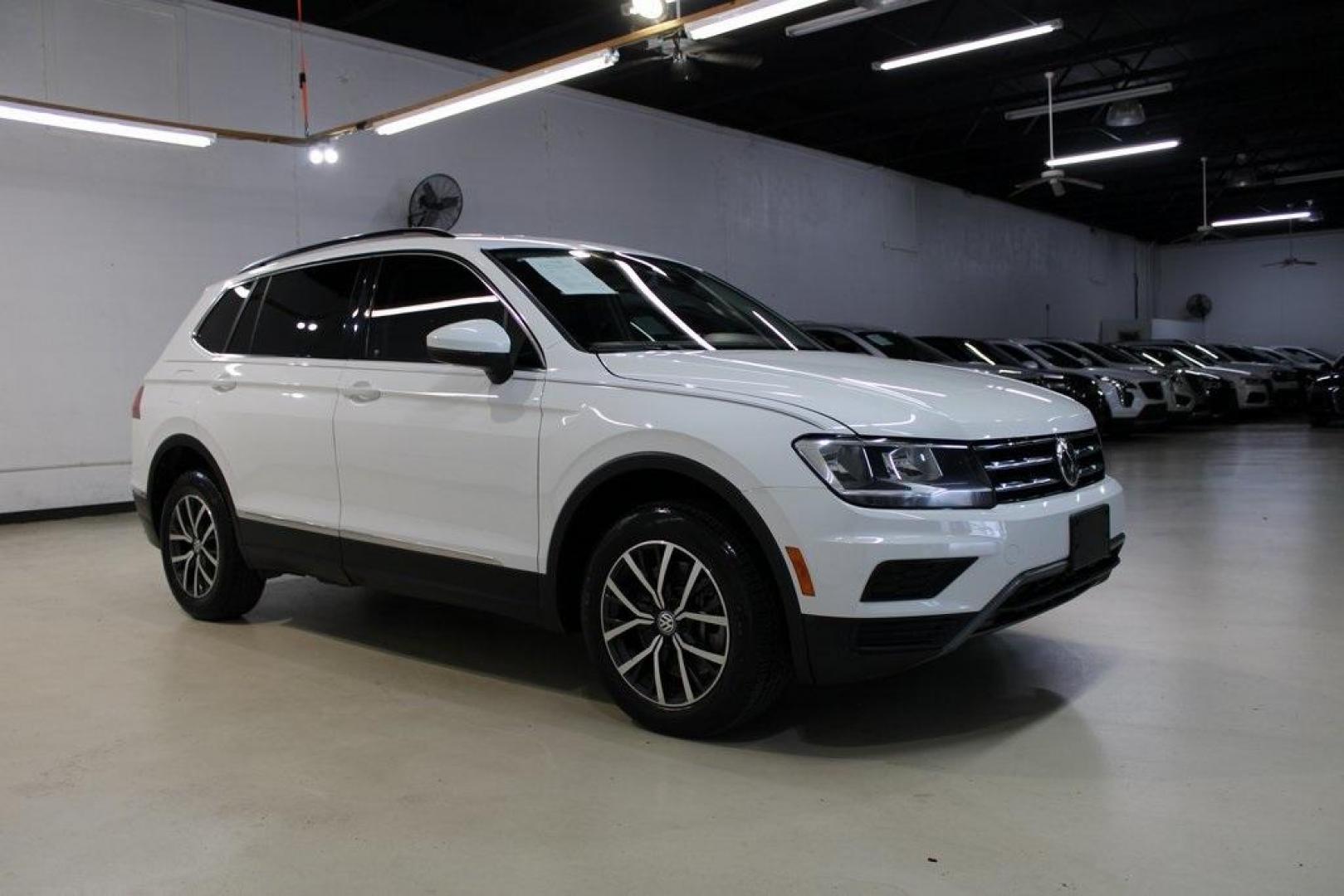 2018 Pure White /Golden Oak and Black Volkswagen Tiguan 2.0T SE (3VV3B7AX1JM) with an 2.0L TSI DOHC engine, Automatic transmission, located at 15300 Midway Rd., Addison, TX, 75001, (972) 702-0011, 32.958321, -96.838074 - Photo#6