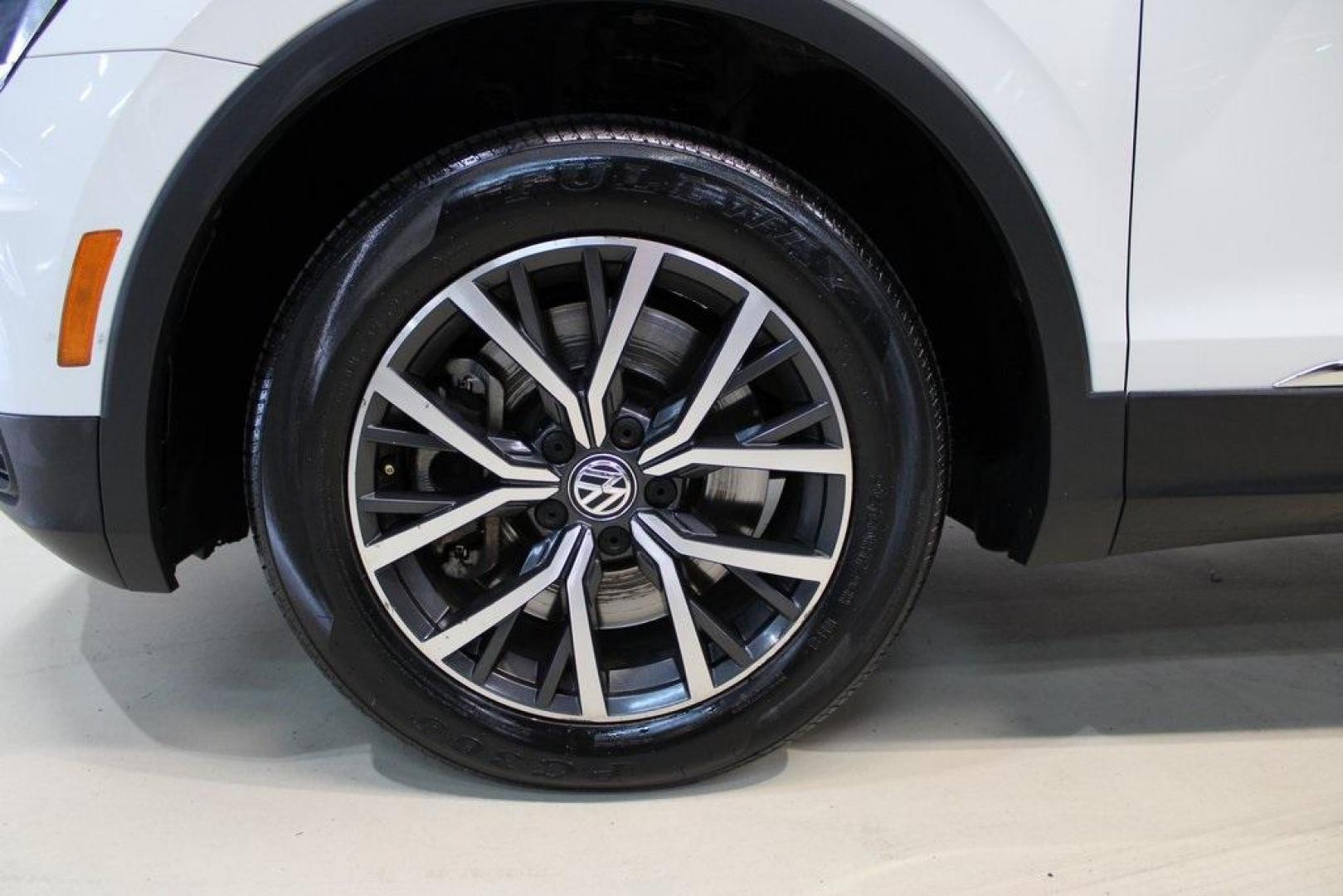 2018 Pure White /Golden Oak and Black Volkswagen Tiguan 2.0T SE (3VV3B7AX1JM) with an 2.0L TSI DOHC engine, Automatic transmission, located at 15300 Midway Rd., Addison, TX, 75001, (972) 702-0011, 32.958321, -96.838074 - Photo#8