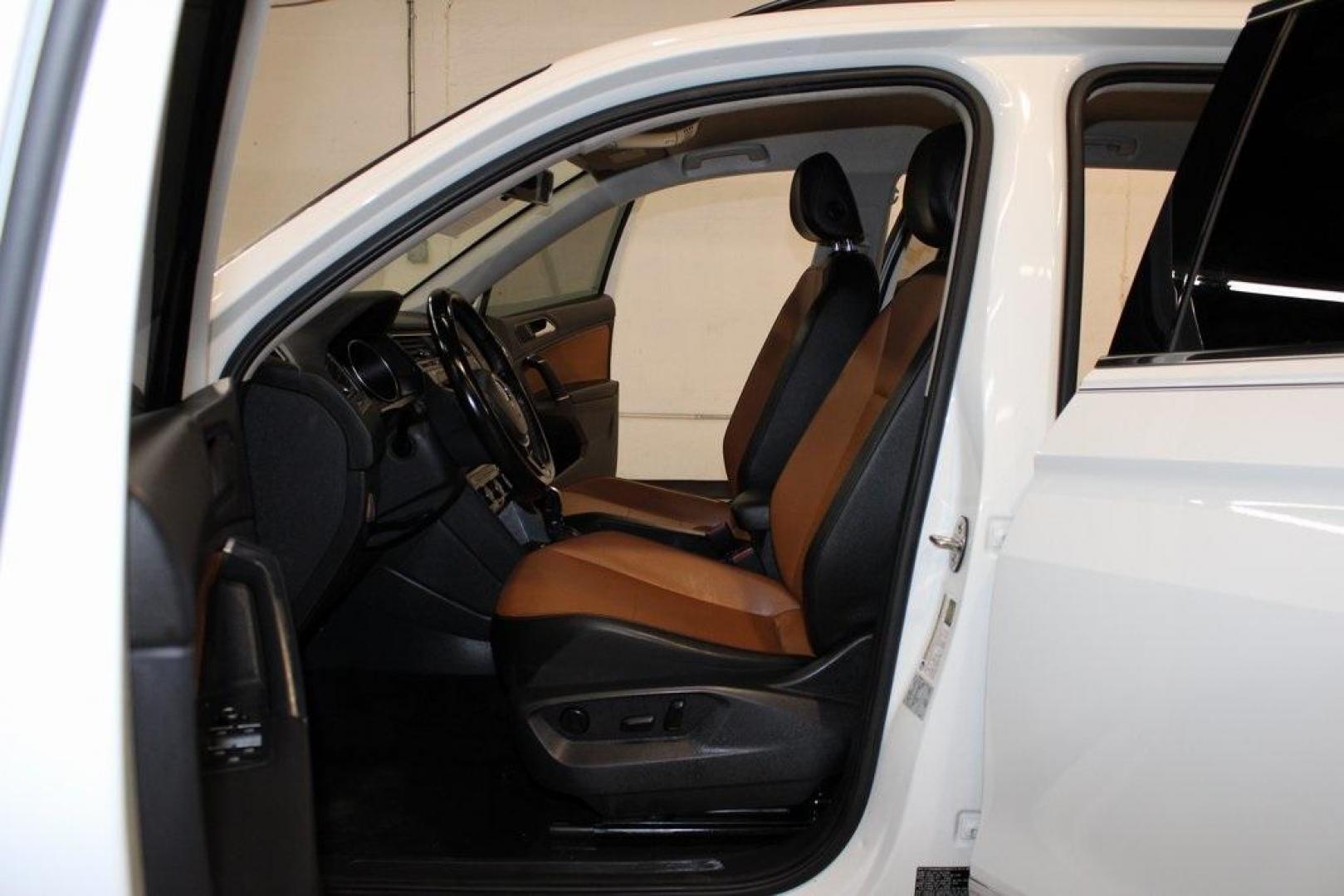 2018 Pure White /Golden Oak and Black Volkswagen Tiguan 2.0T SE (3VV3B7AX1JM) with an 2.0L TSI DOHC engine, Automatic transmission, located at 15300 Midway Rd., Addison, TX, 75001, (972) 702-0011, 32.958321, -96.838074 - Photo#13