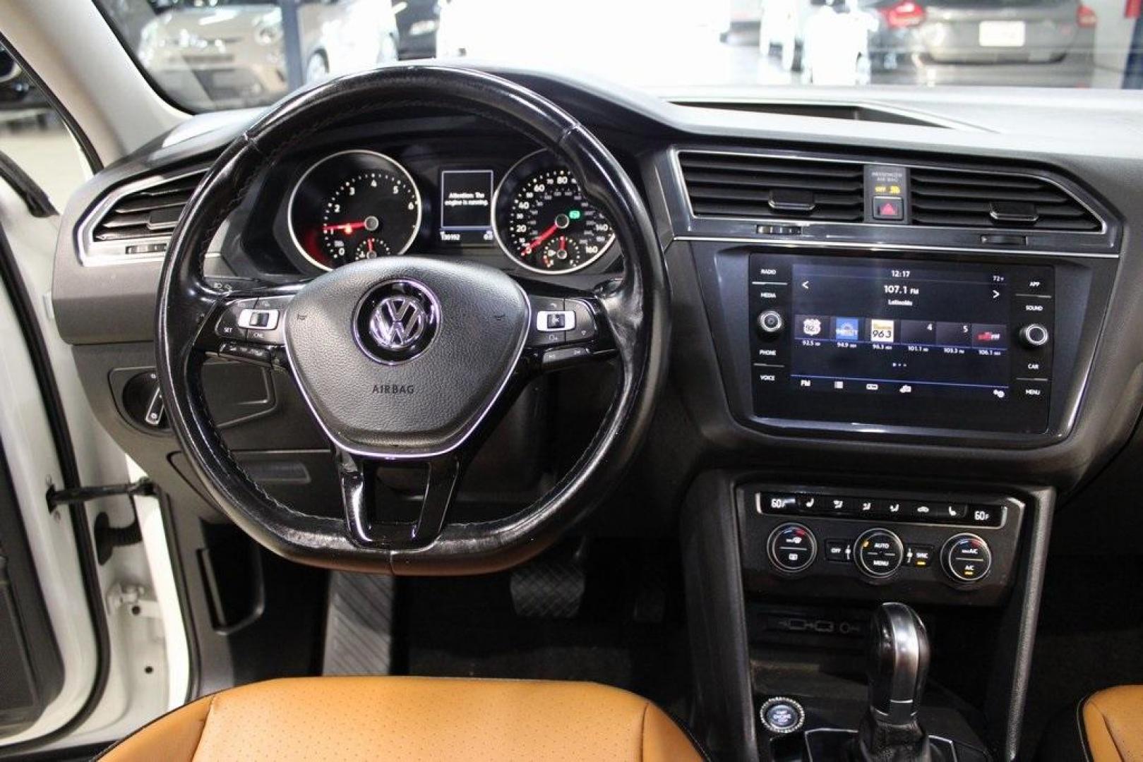 2018 Pure White /Golden Oak and Black Volkswagen Tiguan 2.0T SE (3VV3B7AX1JM) with an 2.0L TSI DOHC engine, Automatic transmission, located at 15300 Midway Rd., Addison, TX, 75001, (972) 702-0011, 32.958321, -96.838074 - Photo#17