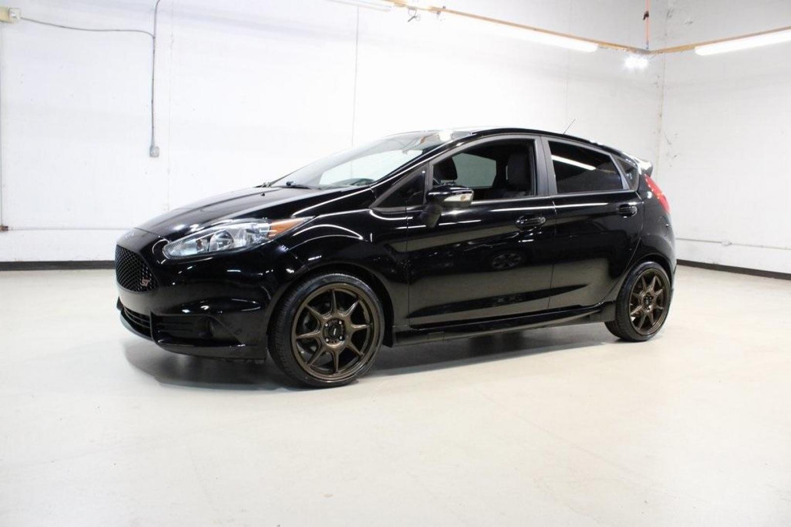 2017 Shadow Black /Smoke Storm Ford Fiesta ST (3FADP4GX7HM) with an EcoBoost 1.6L I4 GTDi DOHC Turbocharged VCT engine, Manual transmission, located at 15300 Midway Rd., Addison, TX, 75001, (972) 702-0011, 32.958321, -96.838074 - Photo#4