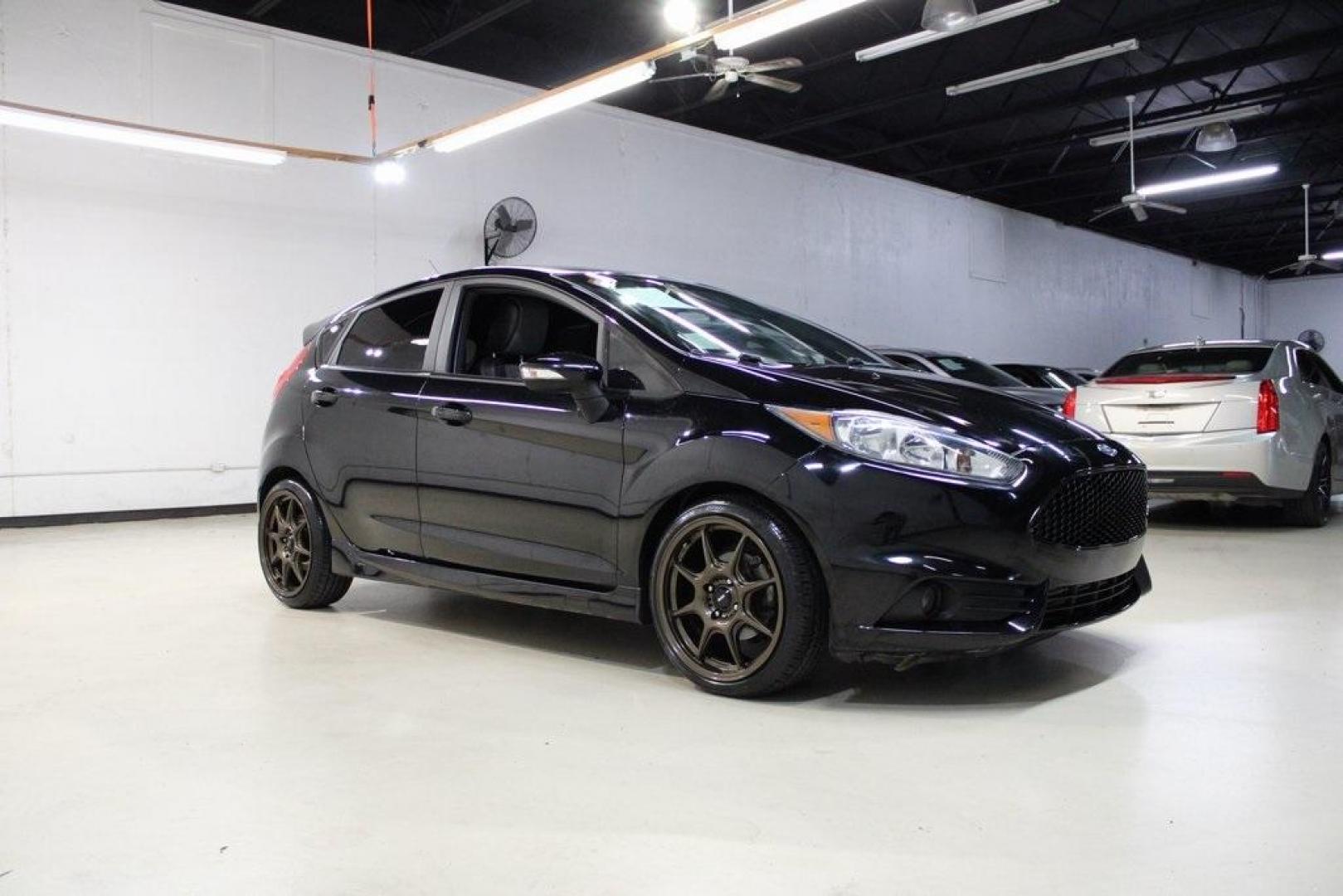 2017 Shadow Black /Smoke Storm Ford Fiesta ST (3FADP4GX7HM) with an EcoBoost 1.6L I4 GTDi DOHC Turbocharged VCT engine, Manual transmission, located at 15300 Midway Rd., Addison, TX, 75001, (972) 702-0011, 32.958321, -96.838074 - Photo#6