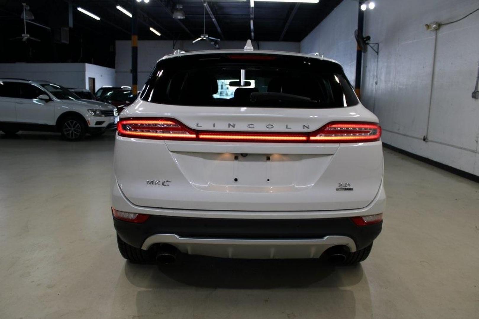 2016 White Platinum Clearcoat Metallic /White Sands/Espresso Lincoln MKC Reserve (5LMCJ3C98GU) with an EcoBoost 2.0L I4 GTDi DOHC Turbocharged VCT engine, Automatic transmission, located at 15300 Midway Rd., Addison, TX, 75001, (972) 702-0011, 32.958321, -96.838074 - Photo#7