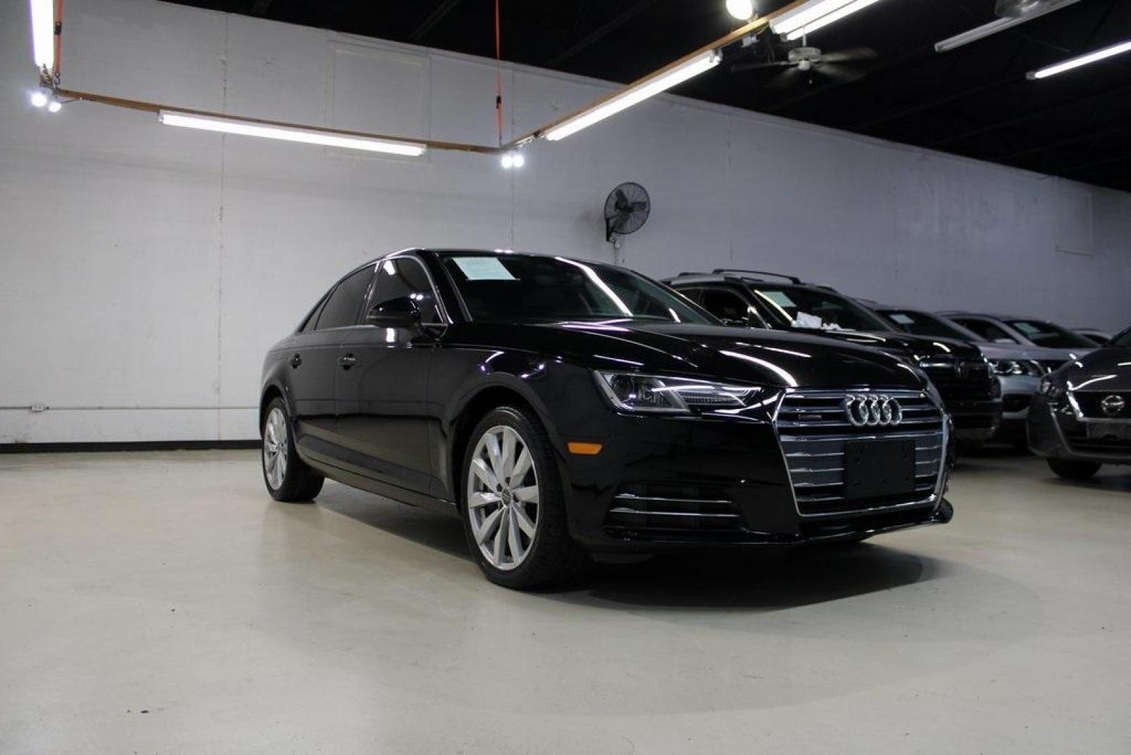 2017 Black Metallic /Black Audi A4 2.0T Premium (WAUANAF47HN) with an 2.0L I4 TFSI DOHC engine, Automatic transmission, located at 15300 Midway Rd., Addison, TX, 75001, (972) 702-0011, 32.958321, -96.838074 - Photo#1