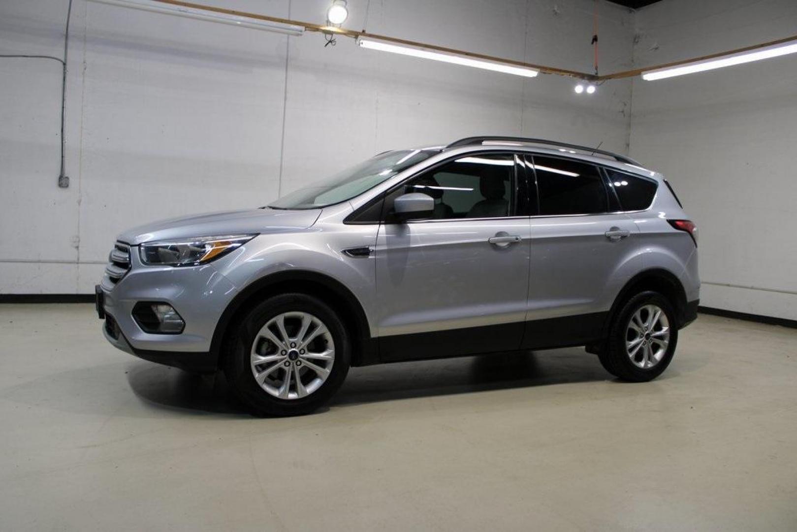 2018 Ingot Silver /Medium Light Stone Ford Escape SE (1FMCU0GD6JU) with an EcoBoost 2.0L I4 GTDi DOHC Turbocharged VCT engine, Automatic transmission, located at 15300 Midway Rd., Addison, TX, 75001, (972) 702-0011, 32.958321, -96.838074 - Photo#5