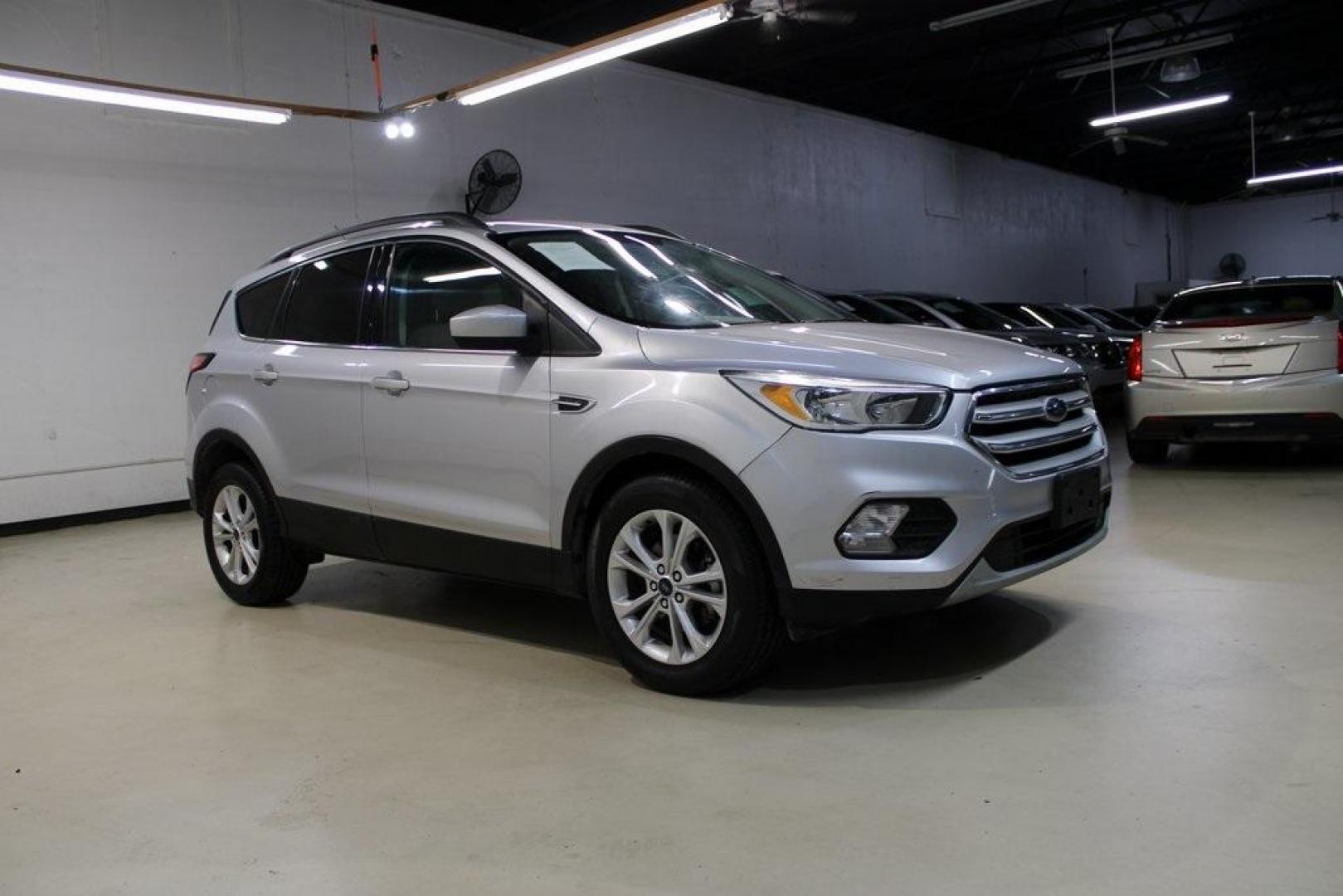 2018 Ingot Silver /Medium Light Stone Ford Escape SE (1FMCU0GD6JU) with an EcoBoost 2.0L I4 GTDi DOHC Turbocharged VCT engine, Automatic transmission, located at 15300 Midway Rd., Addison, TX, 75001, (972) 702-0011, 32.958321, -96.838074 - Photo#7