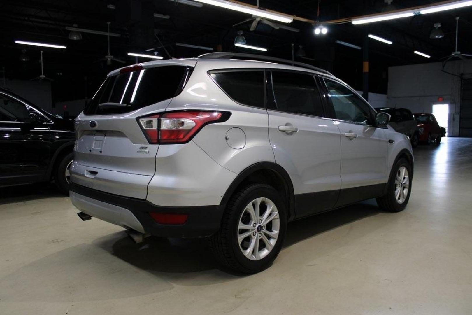2018 Ingot Silver /Medium Light Stone Ford Escape SE (1FMCU0GD6JU) with an EcoBoost 2.0L I4 GTDi DOHC Turbocharged VCT engine, Automatic transmission, located at 15300 Midway Rd., Addison, TX, 75001, (972) 702-0011, 32.958321, -96.838074 - Photo#8
