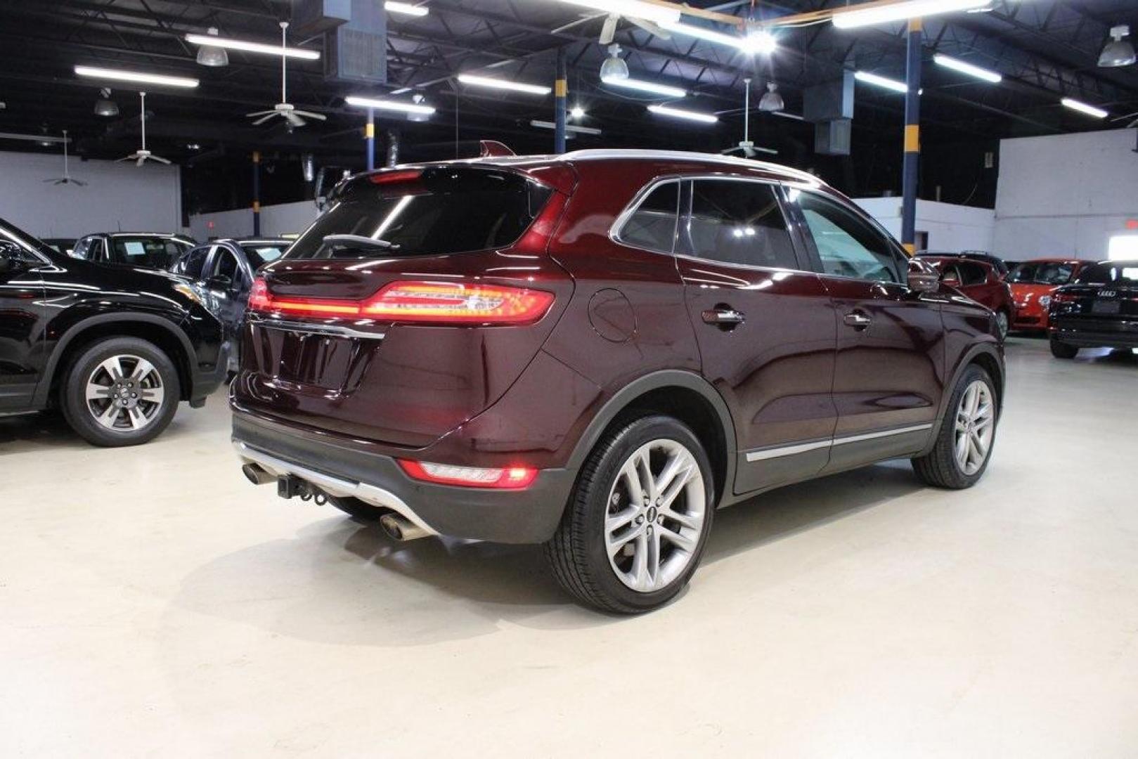 2019 Burgundy /Ebony Lincoln MKC Reserve (5LMCJ3D9XKU) with an 2.0L I4 engine, Automatic transmission, located at 15300 Midway Rd., Addison, TX, 75001, (972) 702-0011, 32.958321, -96.838074 - Photo#2