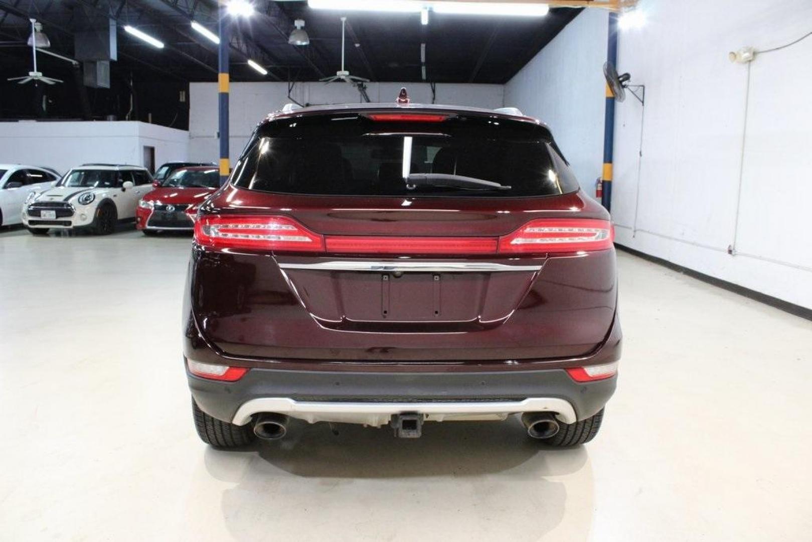 2019 Burgundy /Ebony Lincoln MKC Reserve (5LMCJ3D9XKU) with an 2.0L I4 engine, Automatic transmission, located at 15300 Midway Rd., Addison, TX, 75001, (972) 702-0011, 32.958321, -96.838074 - Photo#7