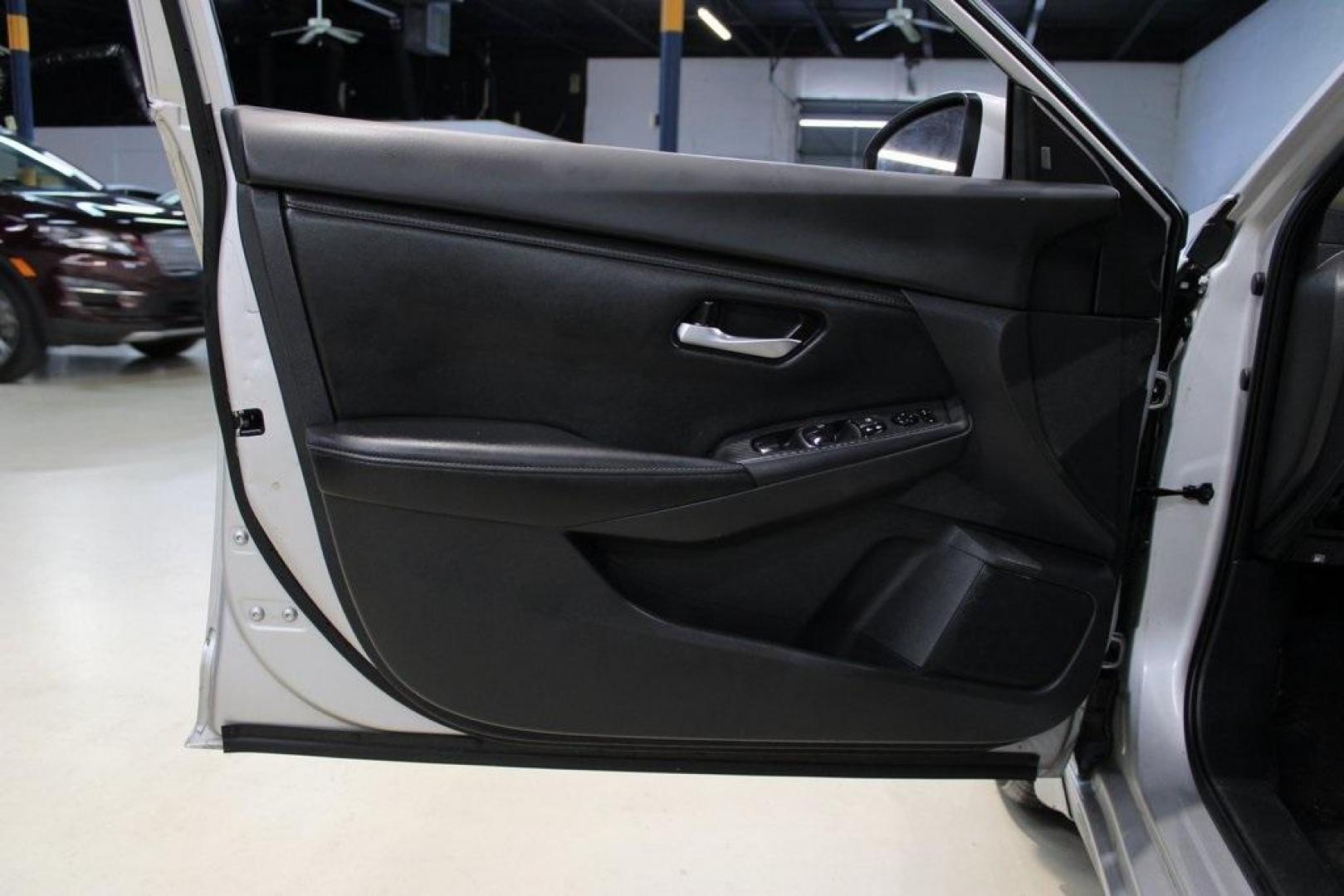 2021 Brilliant Silver Metallic /Charcoal Nissan Sentra S (3N1AB8BV6MY) with an 2.0L DOHC engine, CVT transmission, located at 15300 Midway Rd., Addison, TX, 75001, (972) 702-0011, 32.958321, -96.838074 - Photo#24