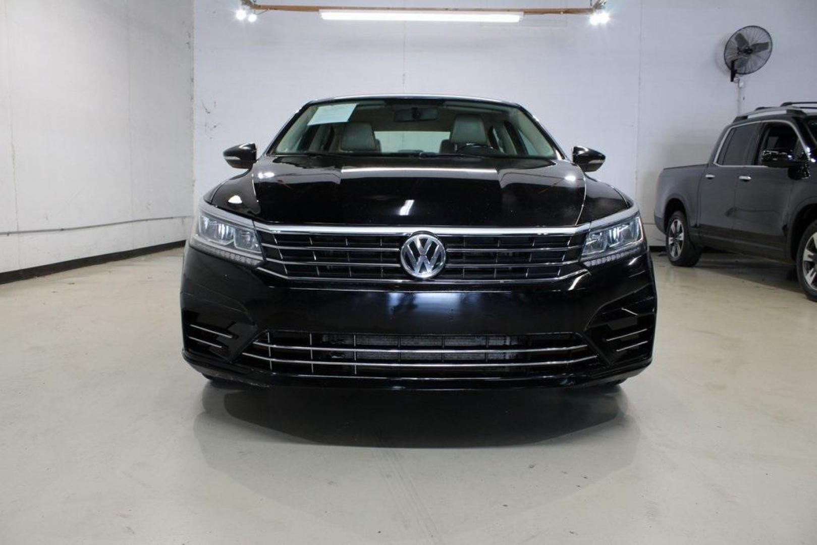 2017 Deep Black /Cornsilk Beige W/Brown Volkswagen Passat 1.8T R-Line (1VWDT7A33HC) with an 1.8L TSI engine, Automatic transmission, located at 15300 Midway Rd., Addison, TX, 75001, (972) 702-0011, 32.958321, -96.838074 - 2017 Volkswagen Passat R-Line<br><br>Now Available at Midway Auto Group, Addison, Texas<br><br>Sporty, refined, and exceptionally comfortablethe 2017 Volkswagen Passat R-Line brings European sophistication and precision to the midsize sedan class. With sleek styling, a turbocharged engine, and a spa - Photo#5