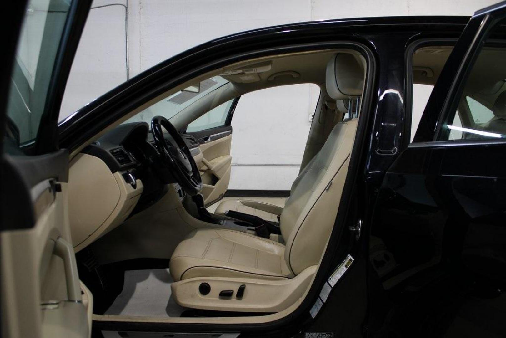 2017 Deep Black /Cornsilk Beige W/Brown Volkswagen Passat 1.8T R-Line (1VWDT7A33HC) with an 1.8L TSI engine, Automatic transmission, located at 15300 Midway Rd., Addison, TX, 75001, (972) 702-0011, 32.958321, -96.838074 - 2017 Volkswagen Passat R-Line<br><br>Now Available at Midway Auto Group, Addison, Texas<br><br>Sporty, refined, and exceptionally comfortablethe 2017 Volkswagen Passat R-Line brings European sophistication and precision to the midsize sedan class. With sleek styling, a turbocharged engine, and a spa - Photo#12