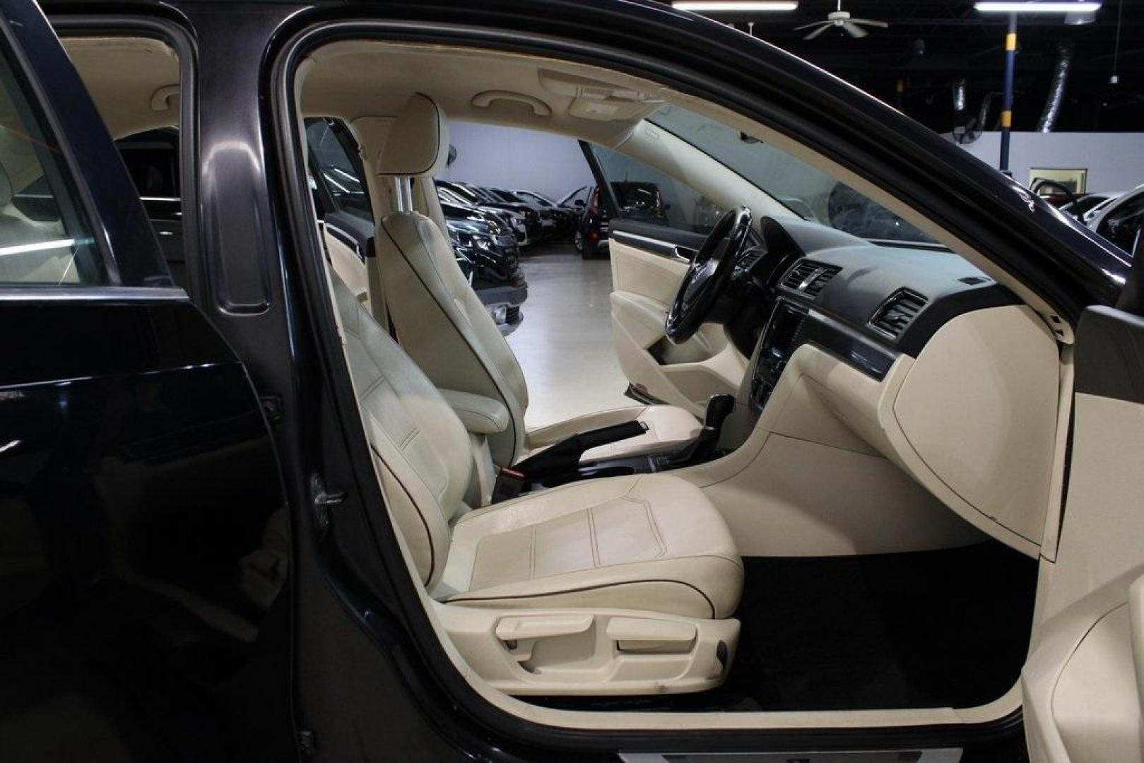 2017 Deep Black /Cornsilk Beige W/Brown Volkswagen Passat 1.8T R-Line (1VWDT7A33HC) with an 1.8L TSI engine, Automatic transmission, located at 15300 Midway Rd., Addison, TX, 75001, (972) 702-0011, 32.958321, -96.838074 - 2017 Volkswagen Passat R-Line<br><br>Now Available at Midway Auto Group, Addison, Texas<br><br>Sporty, refined, and exceptionally comfortablethe 2017 Volkswagen Passat R-Line brings European sophistication and precision to the midsize sedan class. With sleek styling, a turbocharged engine, and a spa - Photo#13