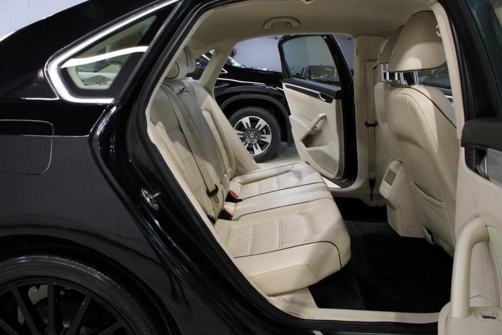 2017 Deep Black /Cornsilk Beige W/Brown Volkswagen Passat 1.8T R-Line (1VWDT7A33HC) with an 1.8L TSI engine, Automatic transmission, located at 15300 Midway Rd., Addison, TX, 75001, (972) 702-0011, 32.958321, -96.838074 - 2017 Volkswagen Passat R-Line<br><br>Now Available at Midway Auto Group, Addison, Texas<br><br>Sporty, refined, and exceptionally comfortablethe 2017 Volkswagen Passat R-Line brings European sophistication and precision to the midsize sedan class. With sleek styling, a turbocharged engine, and a spa - Photo#14