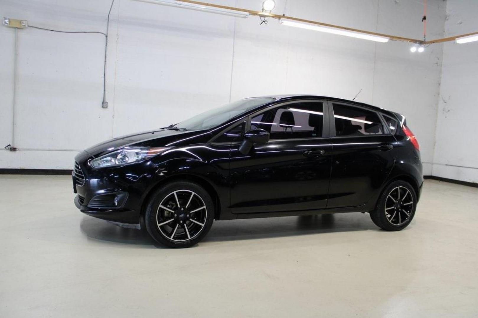 2018 Shadow Black /Charcoal Black Ford Fiesta SE (3FADP4EJ0JM) with an 1.6L I4 Ti-VCT engine, Automatic transmission, located at 15300 Midway Rd., Addison, TX, 75001, (972) 702-0011, 32.958321, -96.838074 - Photo#4