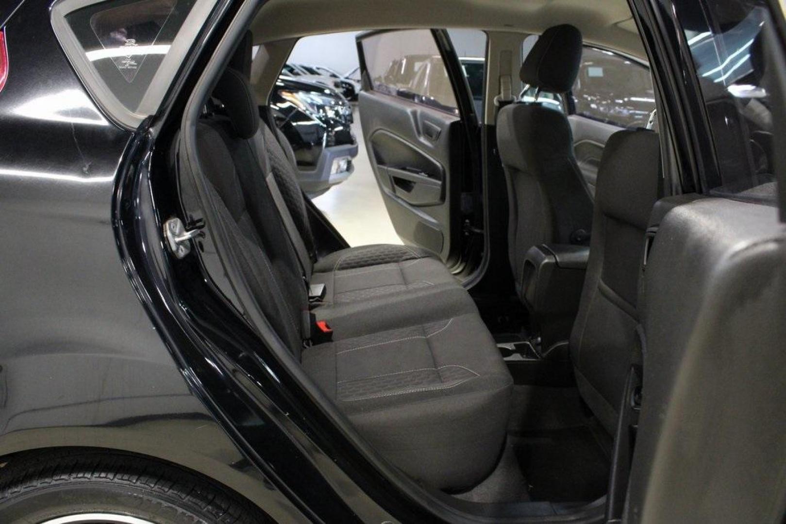 2018 Shadow Black /Charcoal Black Ford Fiesta SE (3FADP4EJ0JM) with an 1.6L I4 Ti-VCT engine, Automatic transmission, located at 15300 Midway Rd., Addison, TX, 75001, (972) 702-0011, 32.958321, -96.838074 - Photo#12