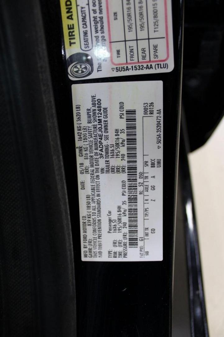 2018 Shadow Black /Charcoal Black Ford Fiesta SE (3FADP4EJ0JM) with an 1.6L I4 Ti-VCT engine, Automatic transmission, located at 15300 Midway Rd., Addison, TX, 75001, (972) 702-0011, 32.958321, -96.838074 - Photo#24