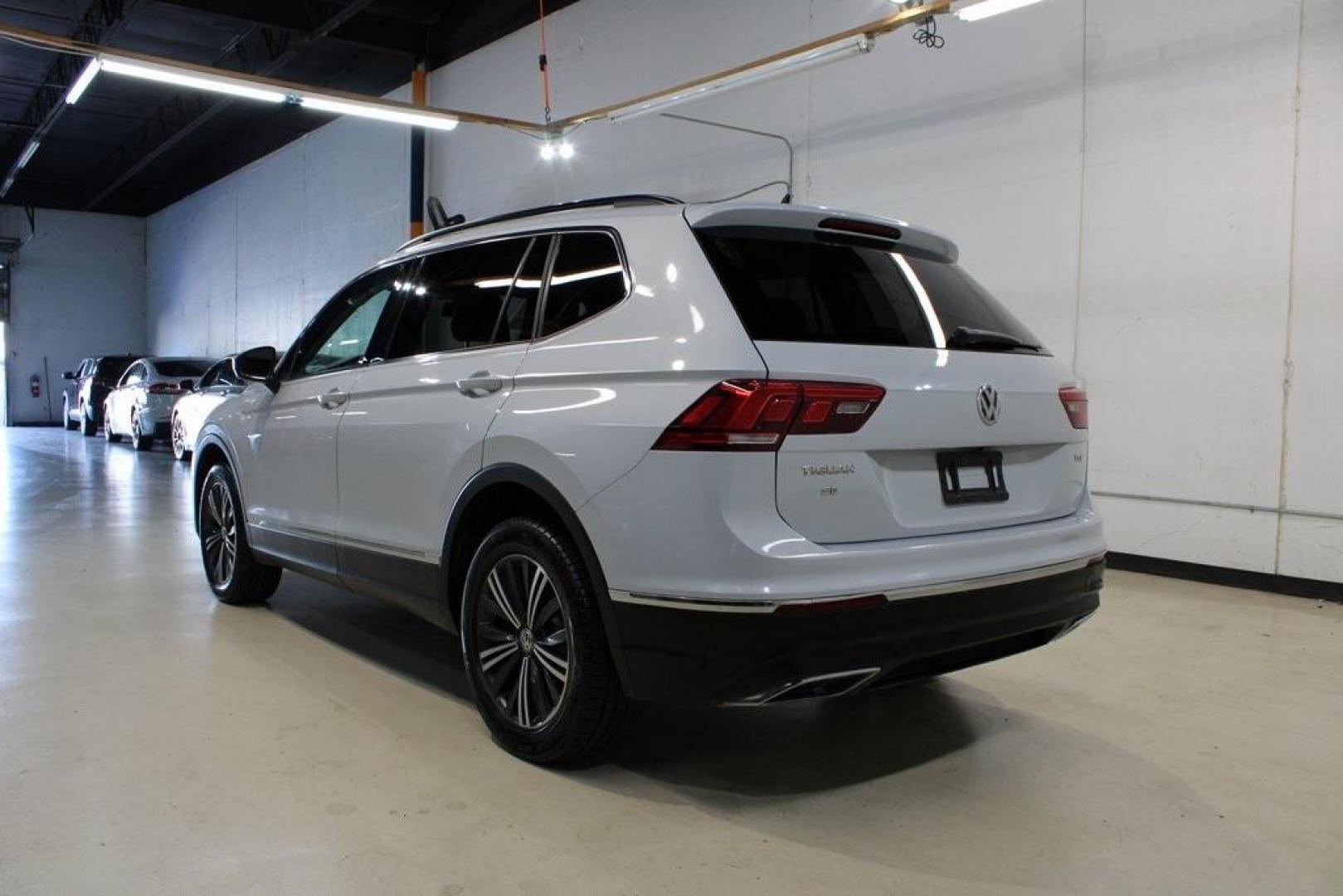 2018 Silk Blue Metallic /Titan Black Volkswagen Tiguan 2.0T SEL (3VV3B7AX2JM) with an 2.0L TSI DOHC engine, Automatic transmission, located at 15300 Midway Rd., Addison, TX, 75001, (972) 702-0011, 32.958321, -96.838074 - Photo#3