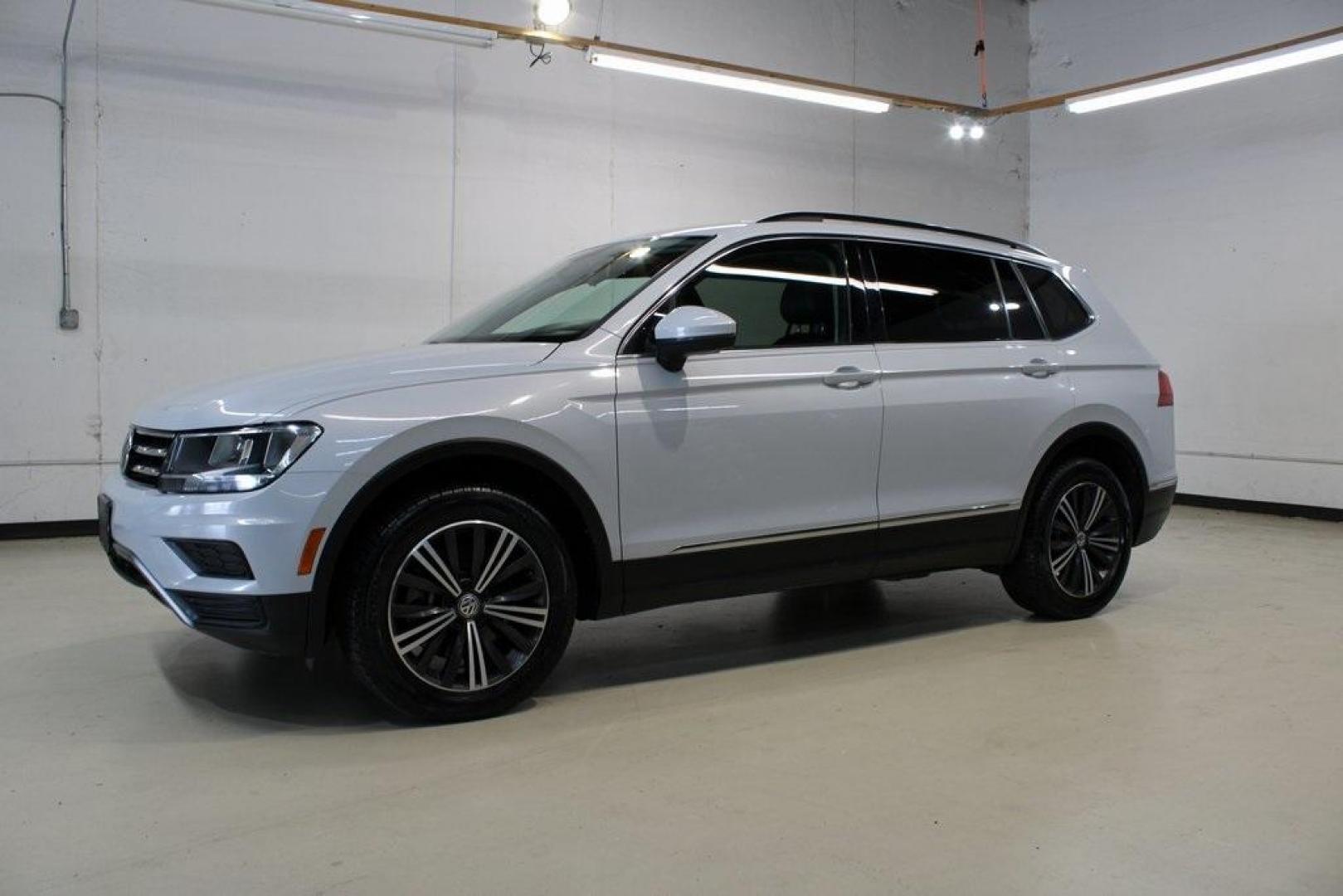 2018 Silk Blue Metallic /Titan Black Volkswagen Tiguan 2.0T SEL (3VV3B7AX2JM) with an 2.0L TSI DOHC engine, Automatic transmission, located at 15300 Midway Rd., Addison, TX, 75001, (972) 702-0011, 32.958321, -96.838074 - Photo#4