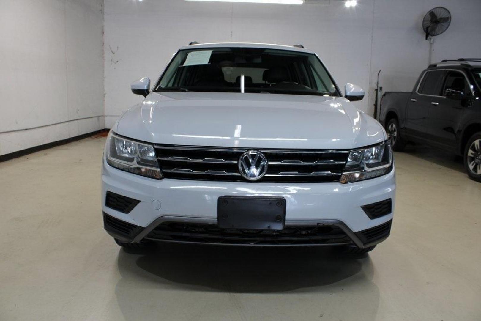 2018 Silk Blue Metallic /Titan Black Volkswagen Tiguan 2.0T SEL (3VV3B7AX2JM) with an 2.0L TSI DOHC engine, Automatic transmission, located at 15300 Midway Rd., Addison, TX, 75001, (972) 702-0011, 32.958321, -96.838074 - Photo#5