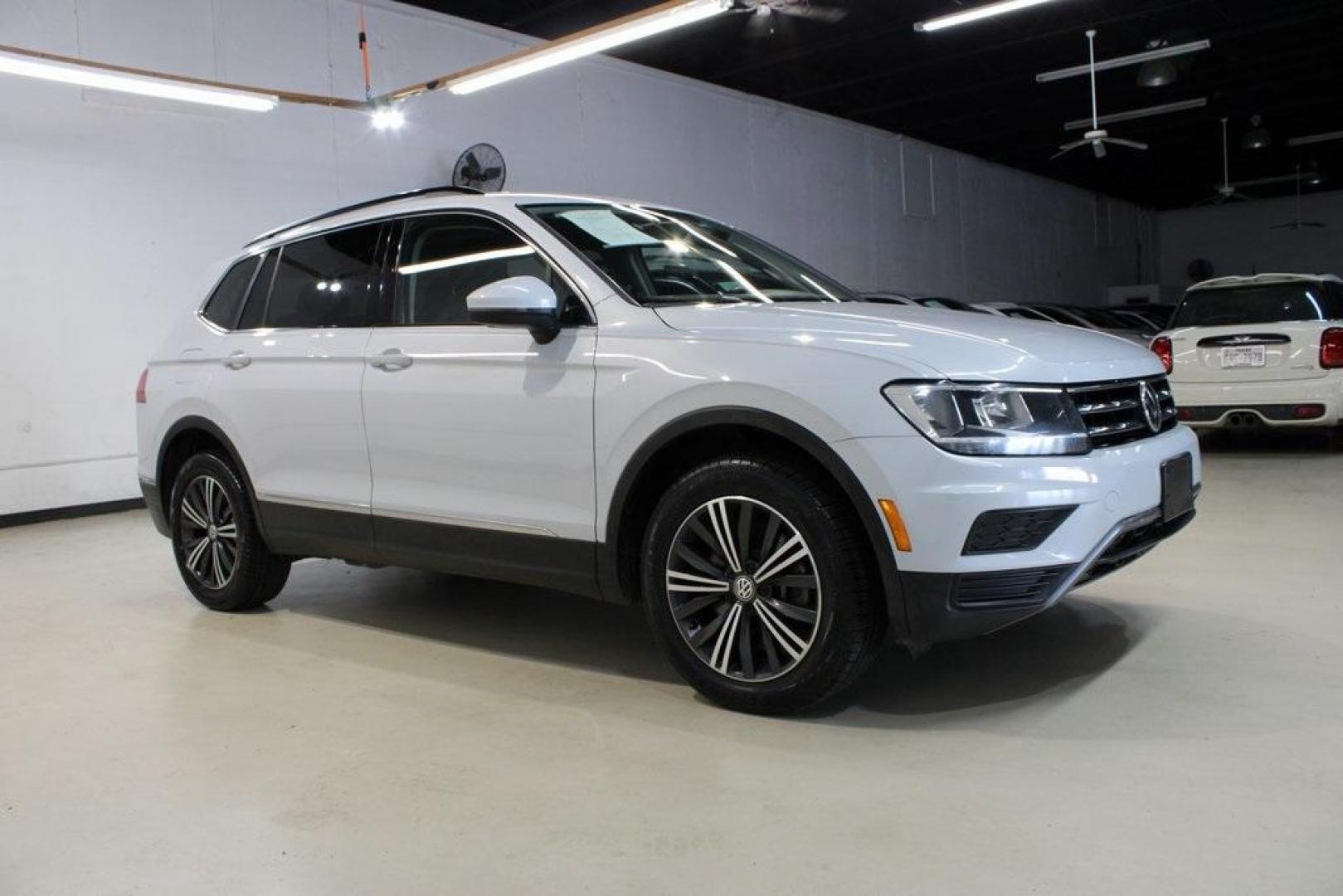 2018 Silk Blue Metallic /Titan Black Volkswagen Tiguan 2.0T SEL (3VV3B7AX2JM) with an 2.0L TSI DOHC engine, Automatic transmission, located at 15300 Midway Rd., Addison, TX, 75001, (972) 702-0011, 32.958321, -96.838074 - Photo#6