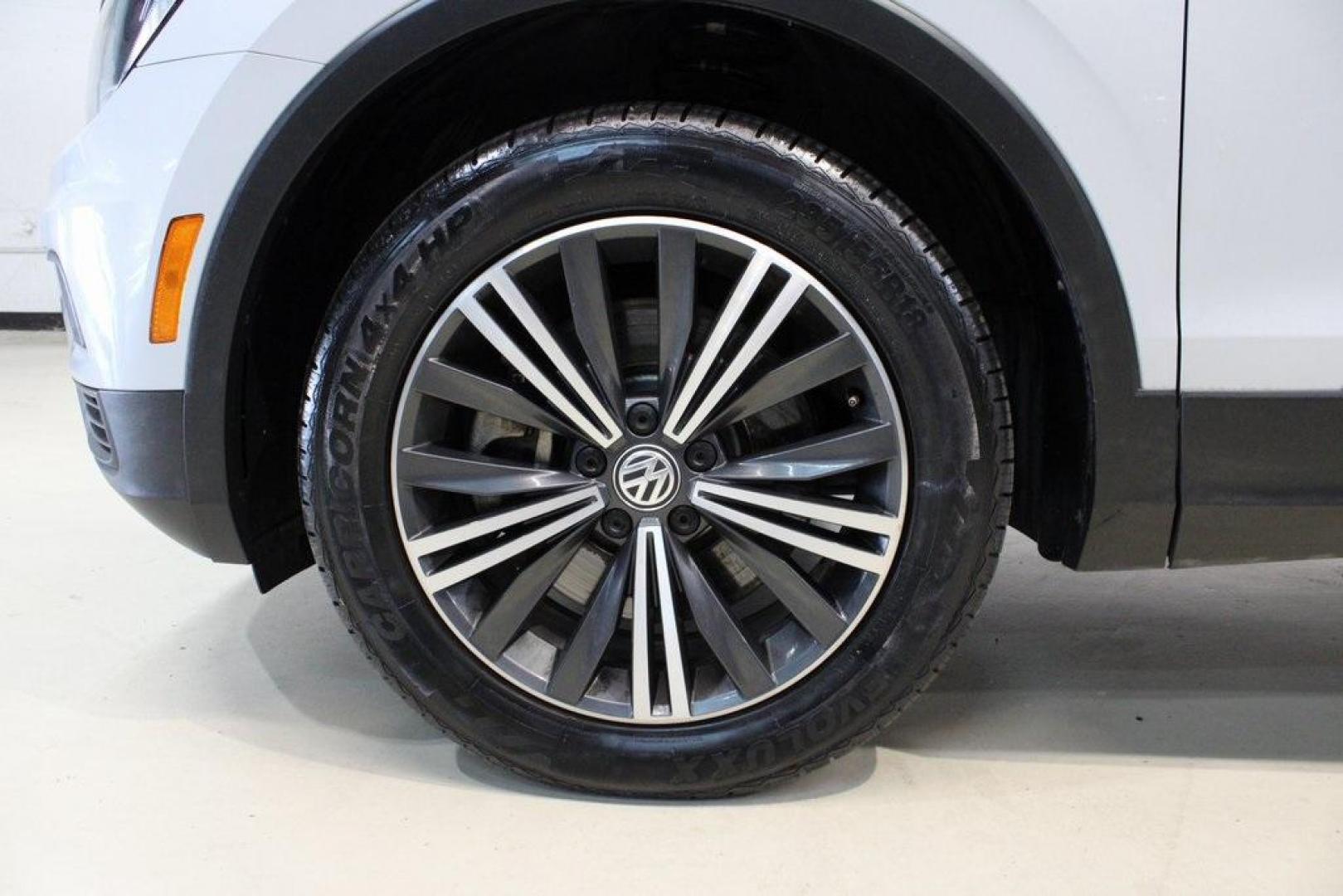 2018 Silk Blue Metallic /Titan Black Volkswagen Tiguan 2.0T SEL (3VV3B7AX2JM) with an 2.0L TSI DOHC engine, Automatic transmission, located at 15300 Midway Rd., Addison, TX, 75001, (972) 702-0011, 32.958321, -96.838074 - Photo#8