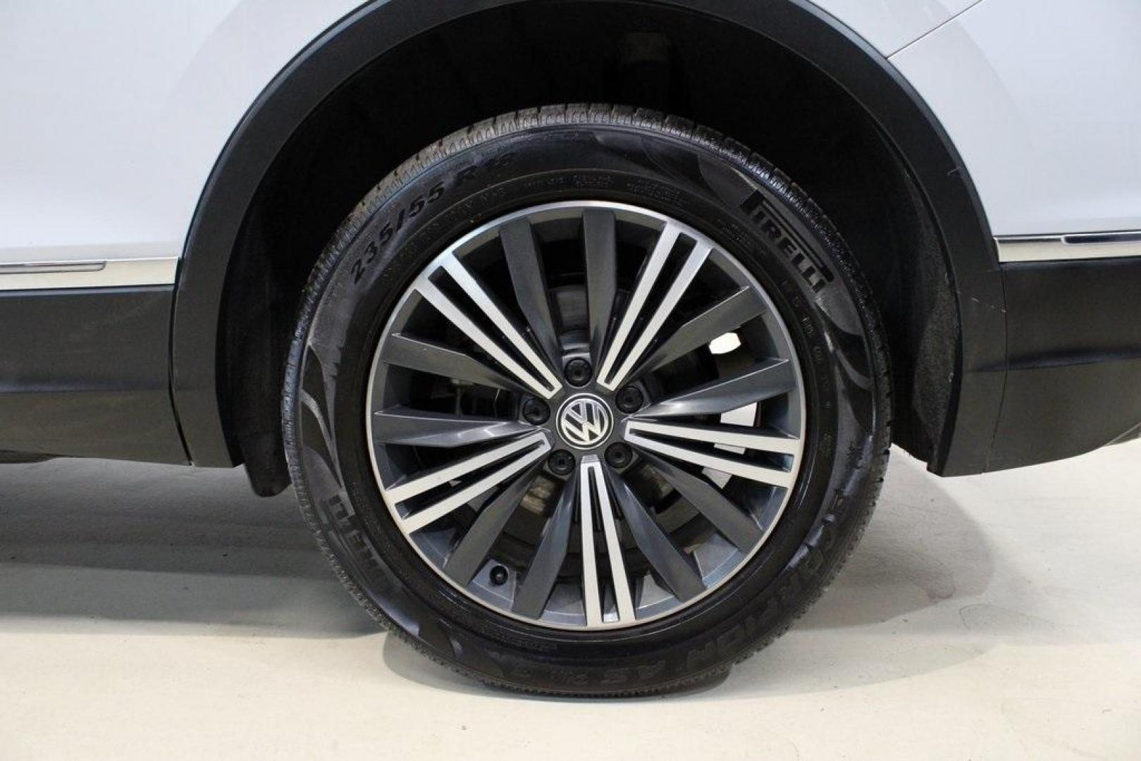 2018 Silk Blue Metallic /Titan Black Volkswagen Tiguan 2.0T SEL (3VV3B7AX2JM) with an 2.0L TSI DOHC engine, Automatic transmission, located at 15300 Midway Rd., Addison, TX, 75001, (972) 702-0011, 32.958321, -96.838074 - Photo#9