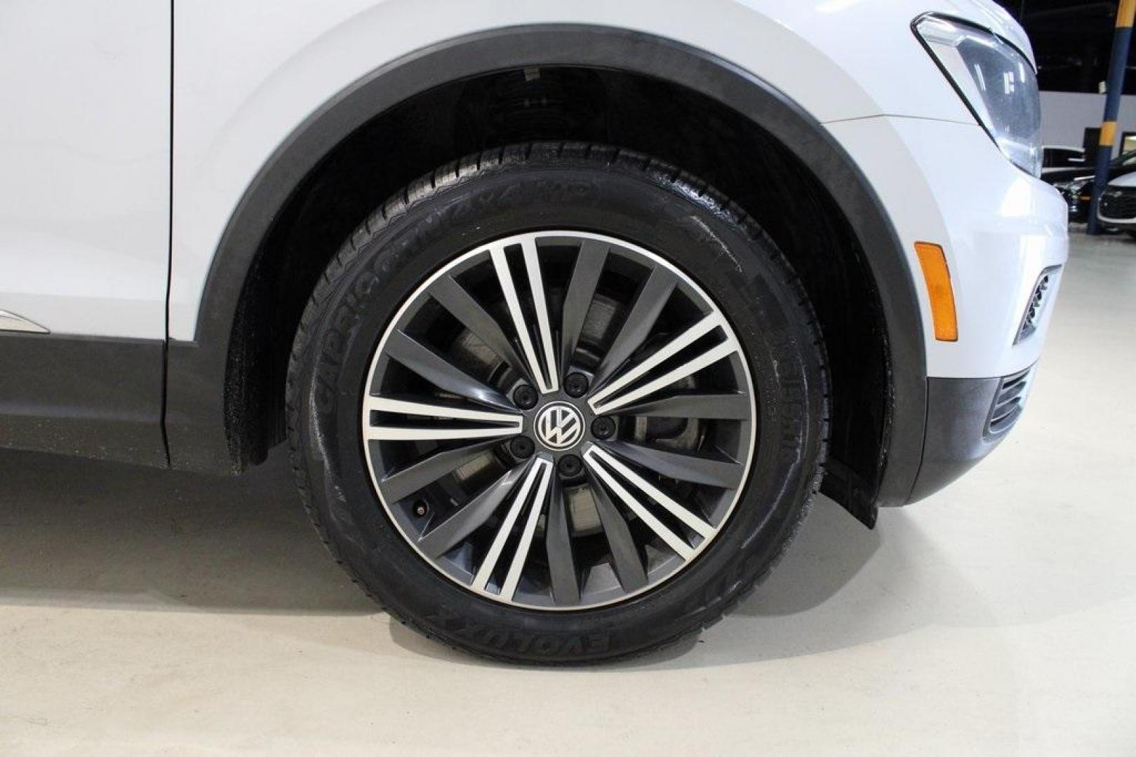 2018 Silk Blue Metallic /Titan Black Volkswagen Tiguan 2.0T SEL (3VV3B7AX2JM) with an 2.0L TSI DOHC engine, Automatic transmission, located at 15300 Midway Rd., Addison, TX, 75001, (972) 702-0011, 32.958321, -96.838074 - Photo#11