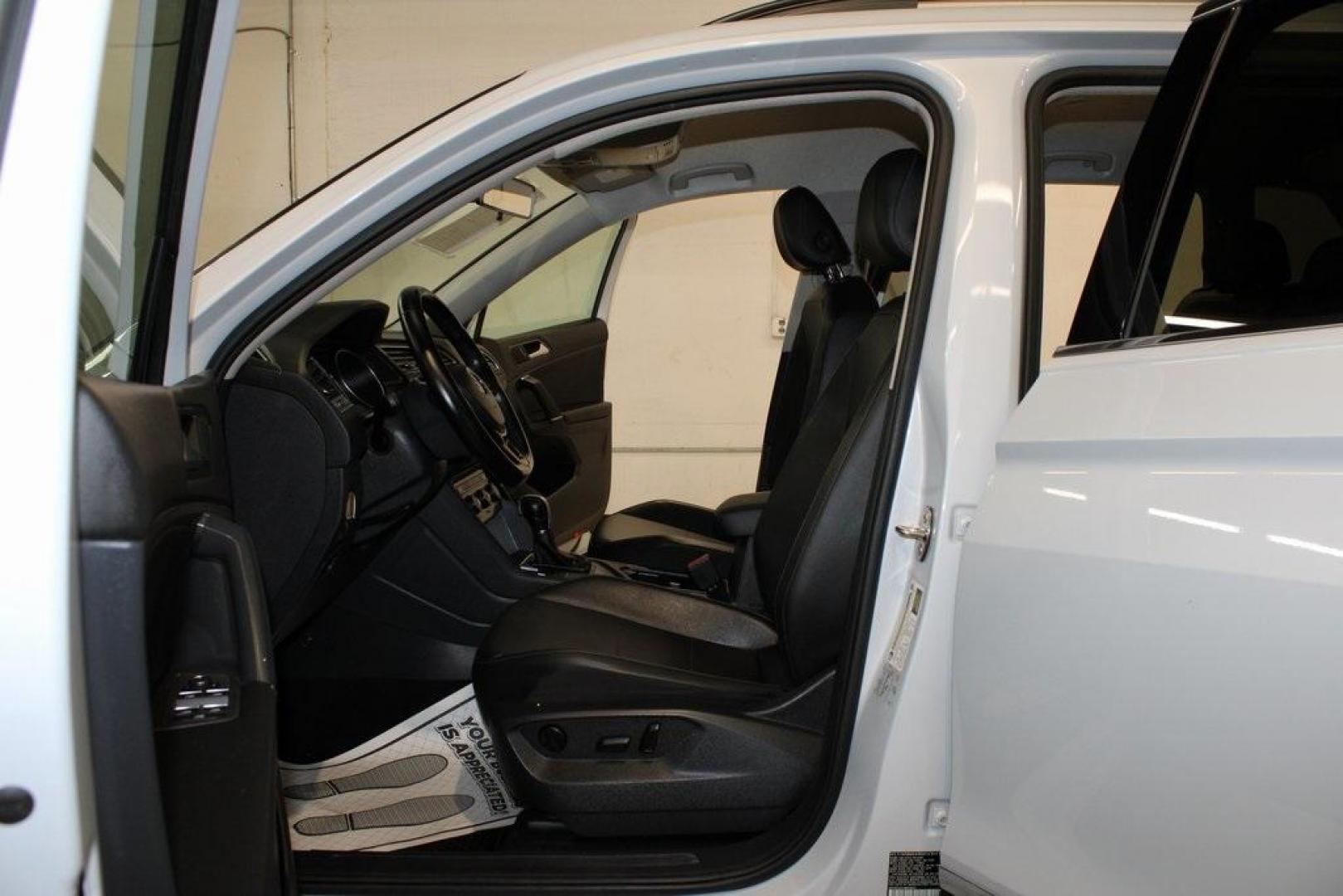 2018 Silk Blue Metallic /Titan Black Volkswagen Tiguan 2.0T SEL (3VV3B7AX2JM) with an 2.0L TSI DOHC engine, Automatic transmission, located at 15300 Midway Rd., Addison, TX, 75001, (972) 702-0011, 32.958321, -96.838074 - Photo#12