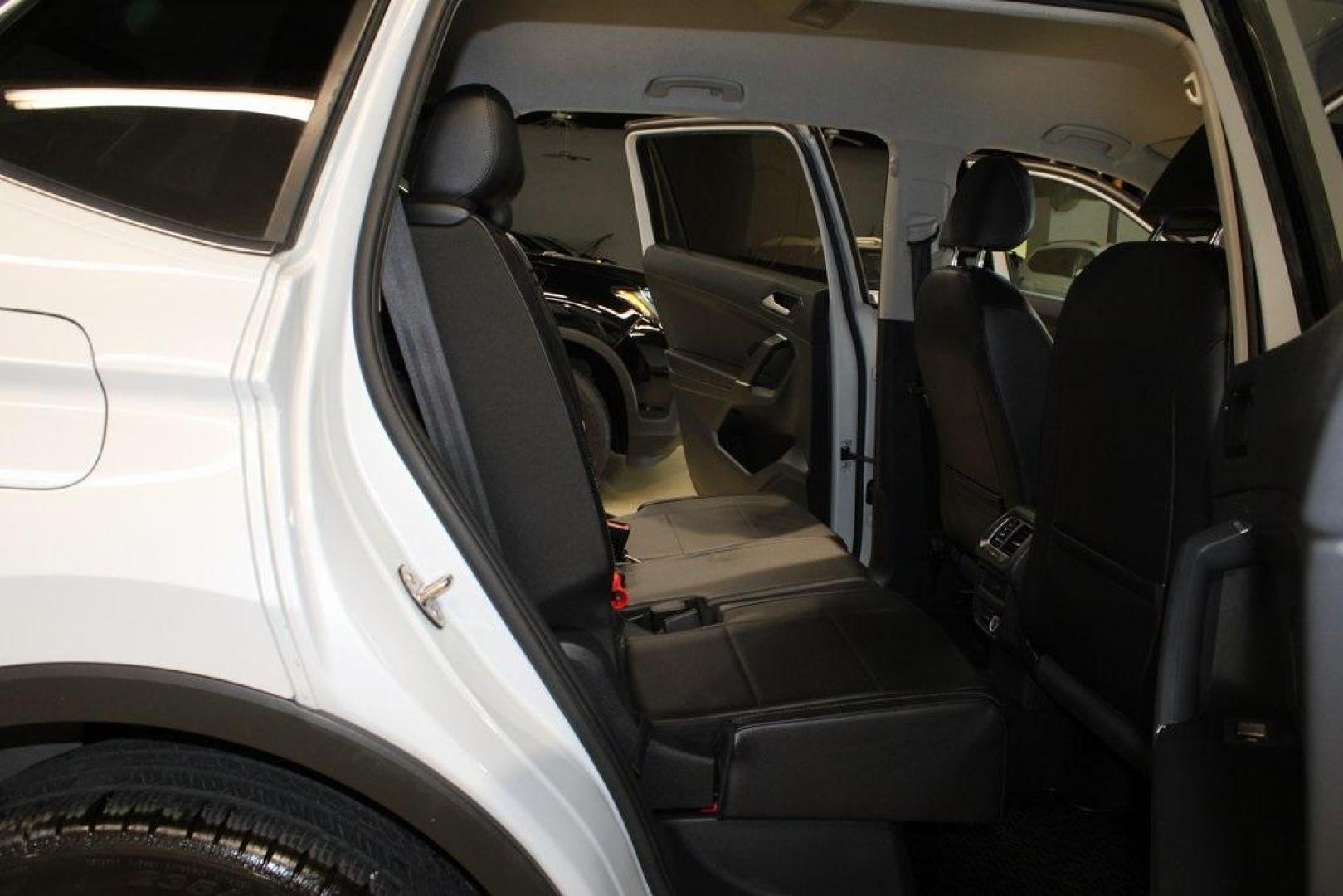 2018 Silk Blue Metallic /Titan Black Volkswagen Tiguan 2.0T SEL (3VV3B7AX2JM) with an 2.0L TSI DOHC engine, Automatic transmission, located at 15300 Midway Rd., Addison, TX, 75001, (972) 702-0011, 32.958321, -96.838074 - Photo#14