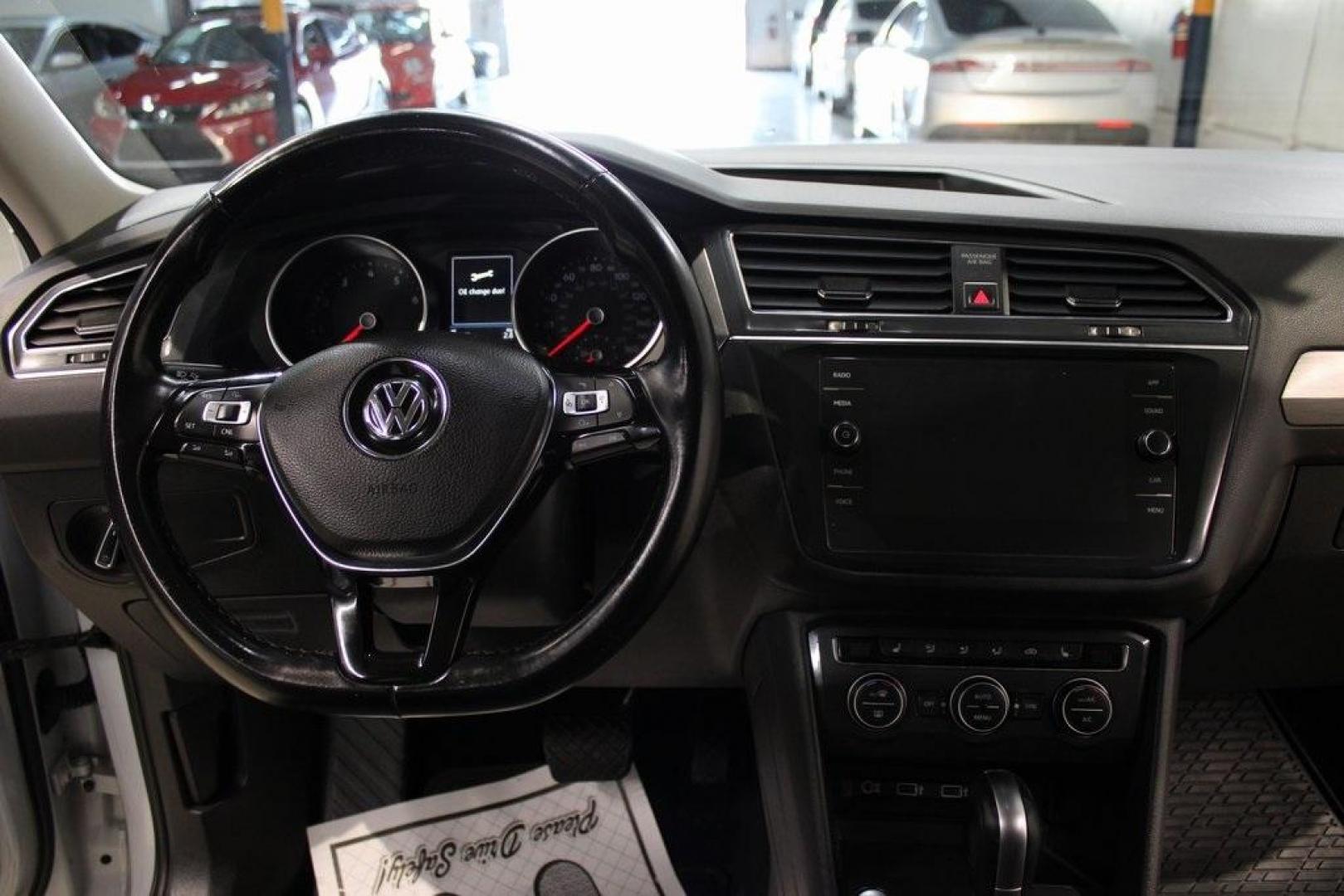 2018 Silk Blue Metallic /Titan Black Volkswagen Tiguan 2.0T SEL (3VV3B7AX2JM) with an 2.0L TSI DOHC engine, Automatic transmission, located at 15300 Midway Rd., Addison, TX, 75001, (972) 702-0011, 32.958321, -96.838074 - Photo#17