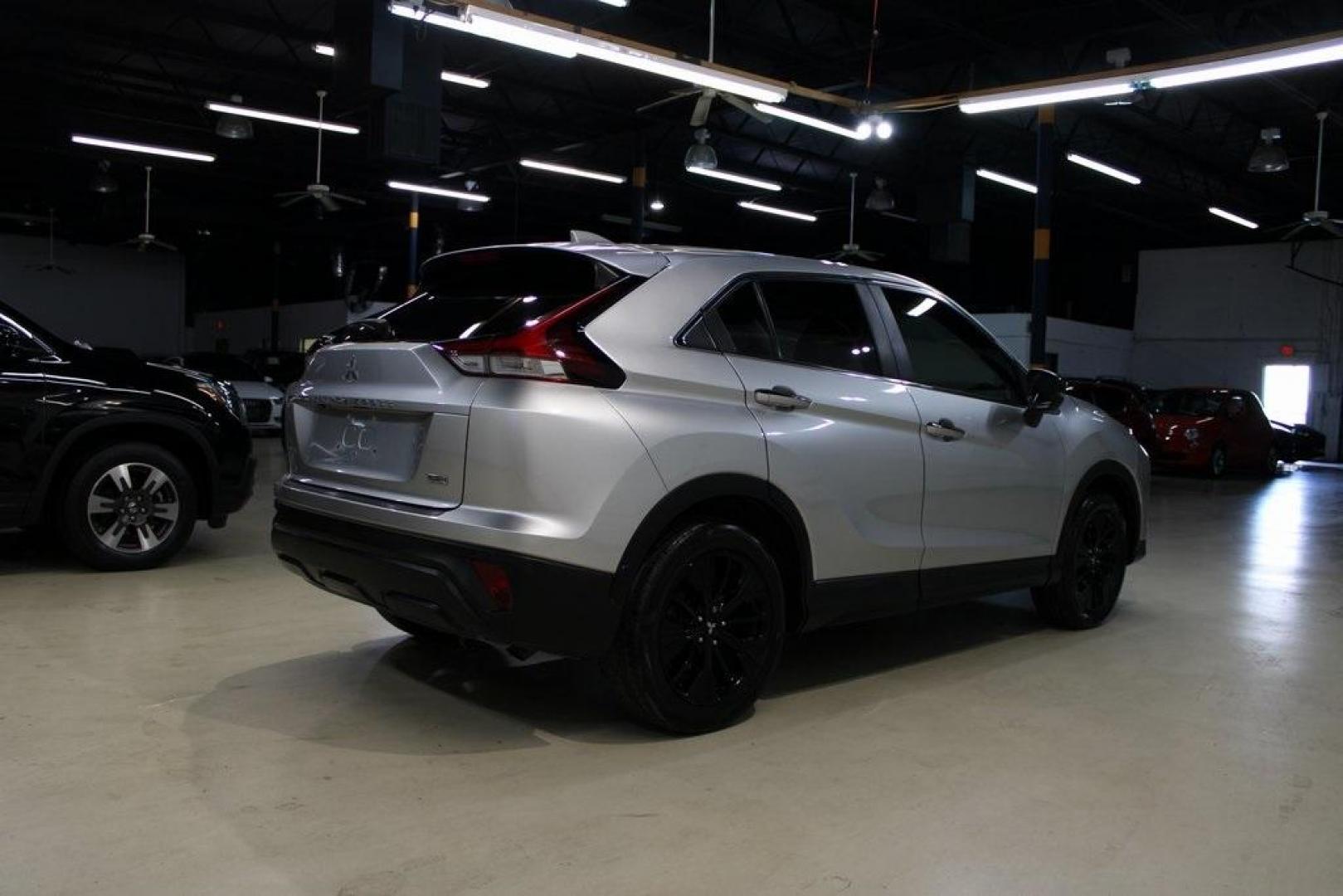 2022 Alloy Silver Metallic /Black Mitsubishi Eclipse Cross LE (JA4ASVAA3NZ) with an 1.5L I4 DI Turbocharged DOHC 16V LEV3-ULEV70 152hp engine, CVT transmission, located at 15300 Midway Rd., Addison, TX, 75001, (972) 702-0011, 32.958321, -96.838074 - Photo#2