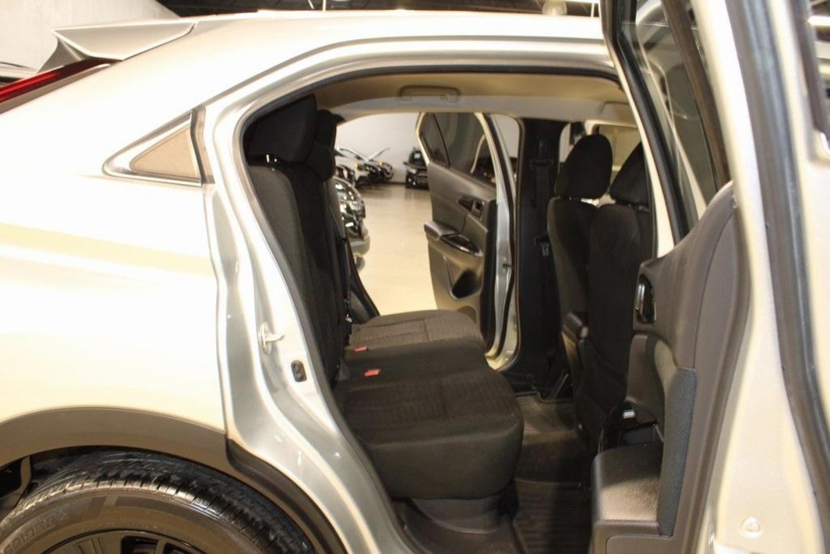 2022 Alloy Silver Metallic /Black Mitsubishi Eclipse Cross LE (JA4ASVAA3NZ) with an 1.5L I4 DI Turbocharged DOHC 16V LEV3-ULEV70 152hp engine, CVT transmission, located at 15300 Midway Rd., Addison, TX, 75001, (972) 702-0011, 32.958321, -96.838074 - Photo#14